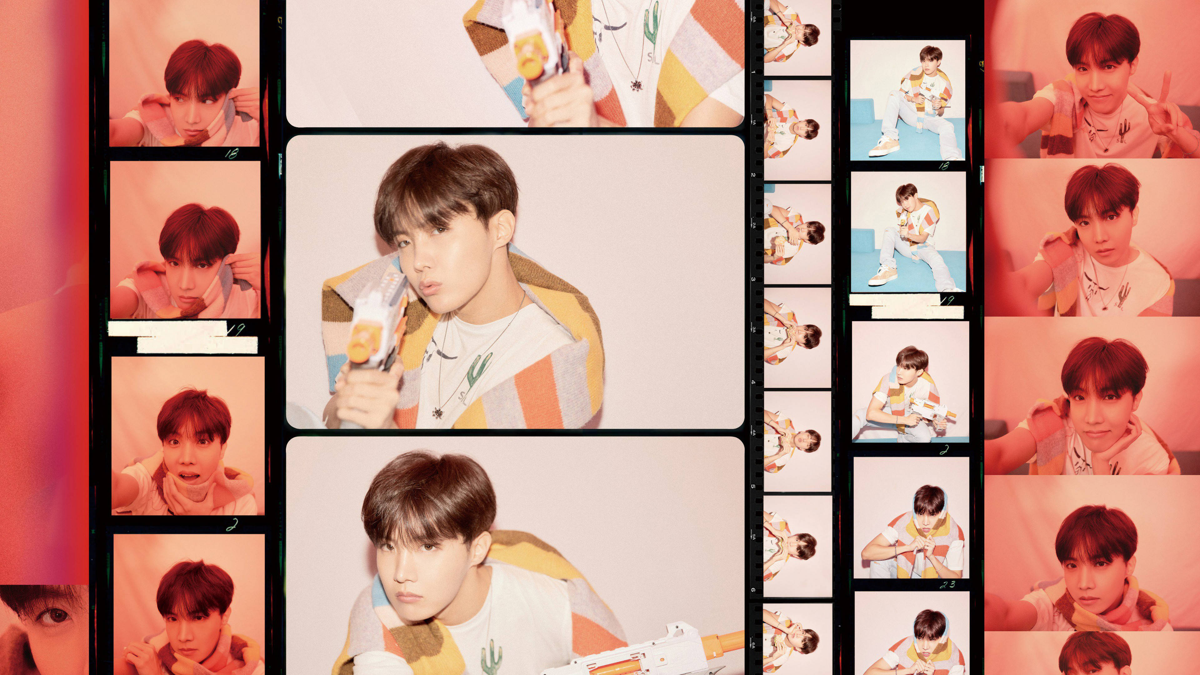 j-hope 桌布 壁紙 — 一名穿著彩色條紋襯衫的年輕男子在多個相框中擺姿勢，沐浴在溫暖的粉紅色和橙色光線中。