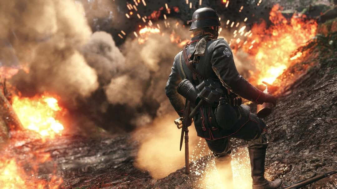 soldier 桌布 壁紙 — 一名穿著第一次世界大戰軍服的士兵，在爆炸和煙霧四起的火熱戰場上前進。