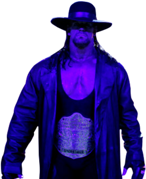 Undertaker 桌布 壁紙 — 一名穿著紫色燈光服裝、戴著寬邊帽和冠軍腰帶的摔角手站在黑色背景前。
