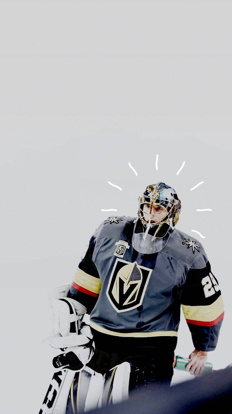 hockey 桌布 壁紙 — 一名穿著維加斯金騎士裝備的冰球守門員，帶著專注的表情和頭頂上發光的白色線條，準備就緒。