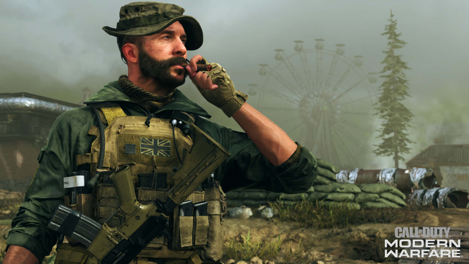 1920x1080 Call Of Duty Modern Warfare 桌布 壁紙 — 一名穿著迷彩裝備的士兵在抽雪茄，站在沙包附近，背景有霧和一個破爛的摩天輪。