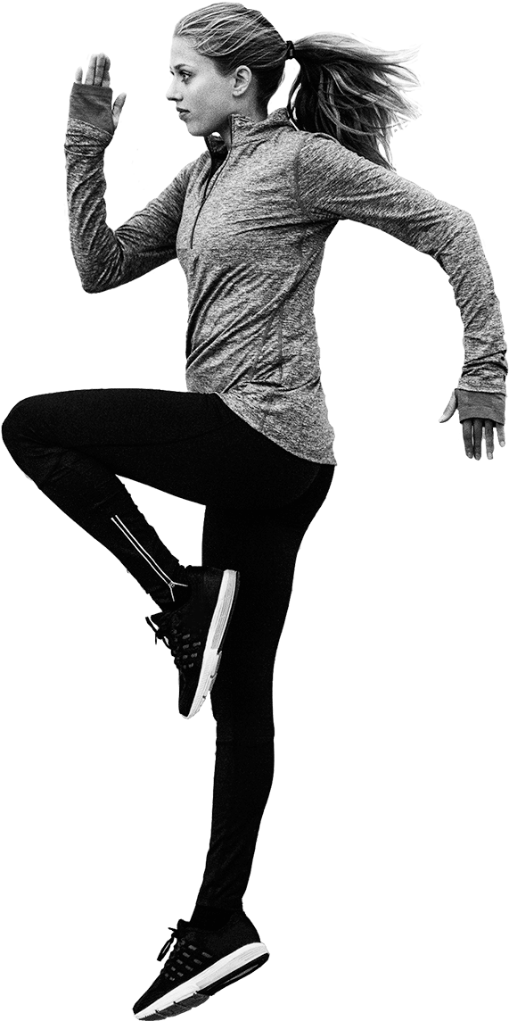 Fitness 桌布 壁紙 — 一名穿著運動裝備的女性，馬尾辮飛揚，在純黑背景下邁步。
