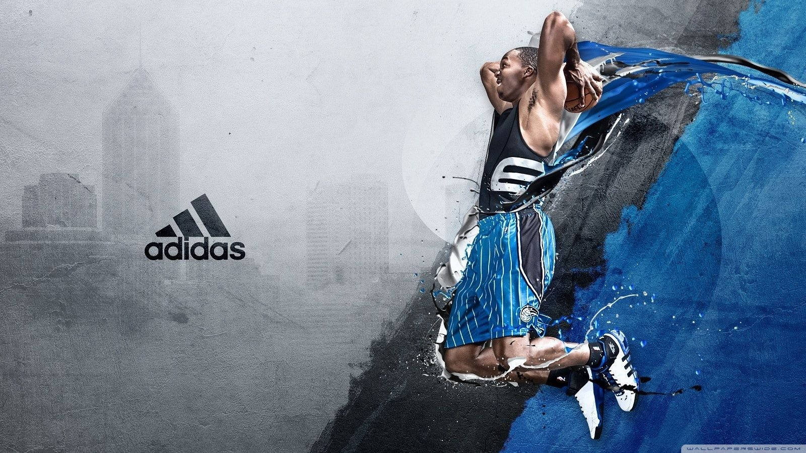 NBA 桌布 壁紙 — 一名籃球運動員在半空中灌籃，背景是粗糙的城市景觀，帶有醒目的藍色油漆噴濺效果。