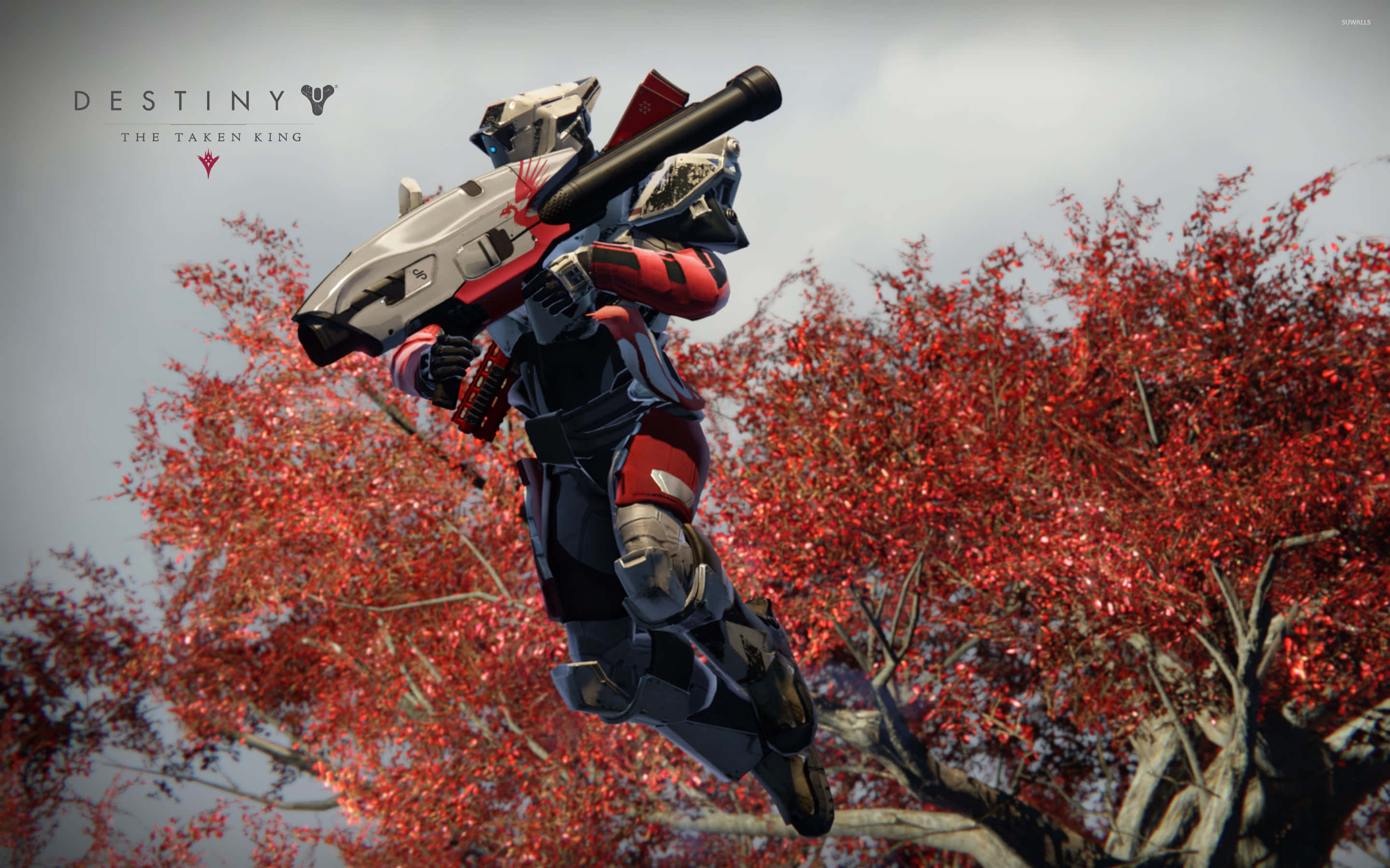 Titan Destiny 2 4K 桌布 壁紙 — 一名紅白裝甲戰士在鮮紅的秋樹間躍起，手持大型未來武器。