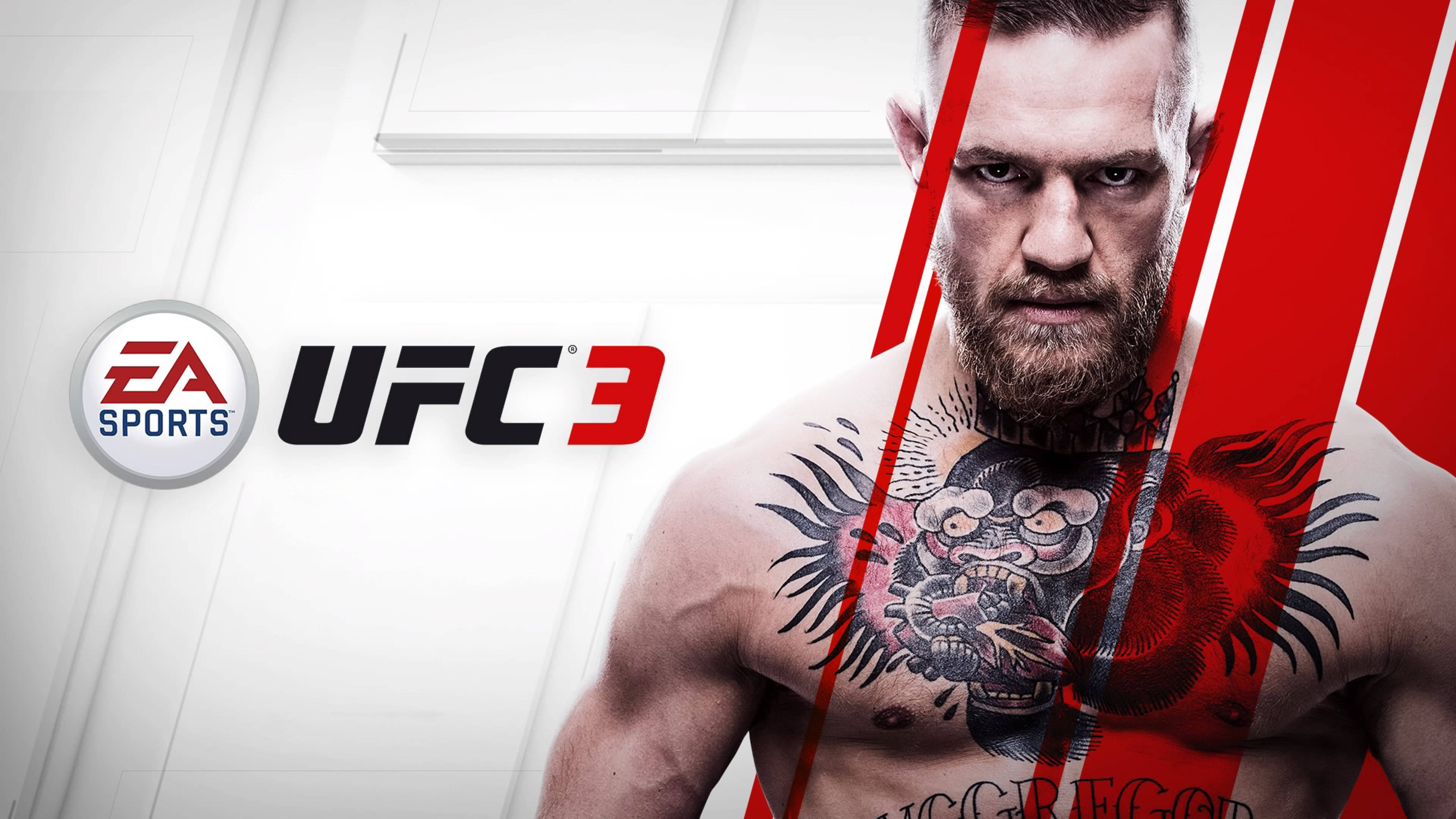 UFC 桌布 壁紙 — 一名肌肉發達的戰士，表情兇猛，胸口有刺青，在鮮明的紅白UFC 3宣傳背景下凝視著。