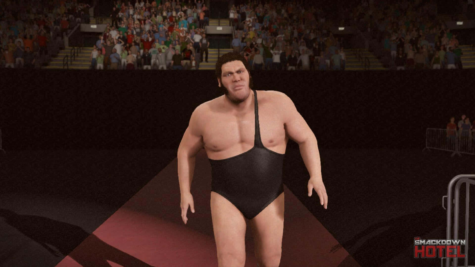 WWE 桌布 壁紙 — 一名肌肉發達的摔角手穿著黑色緊身衣，自信地沿著紅色坡道走向擠滿觀眾的競技場。
