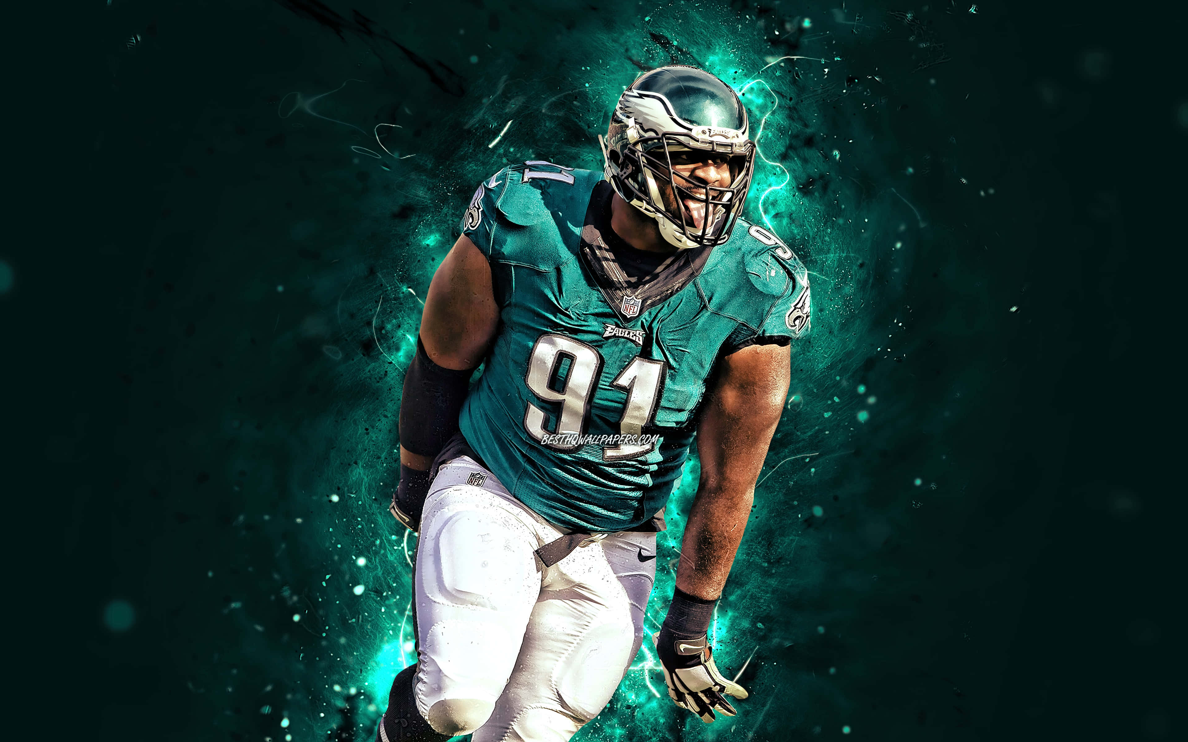 Eagles Football 桌布 壁紙 — 一名身穿91號青綠色球衣的強力足球運動員，在深綠色電能背景下向前衝刺。