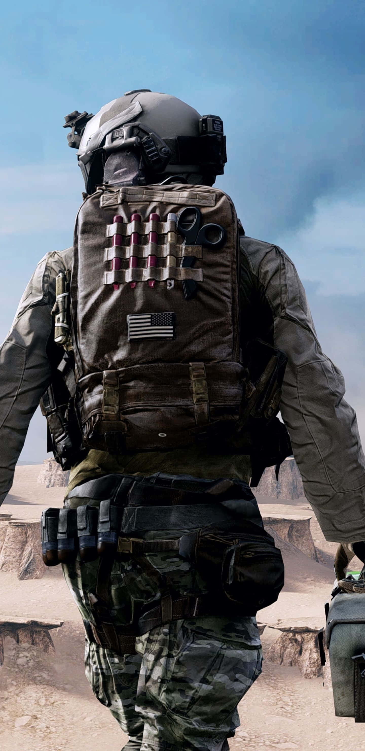 Pixel 3xl Battlefield 4 桌布 壁紙 — 一名身穿全套戰術裝備的士兵在陰天之下走過荒蕪的沙漠峽谷。
