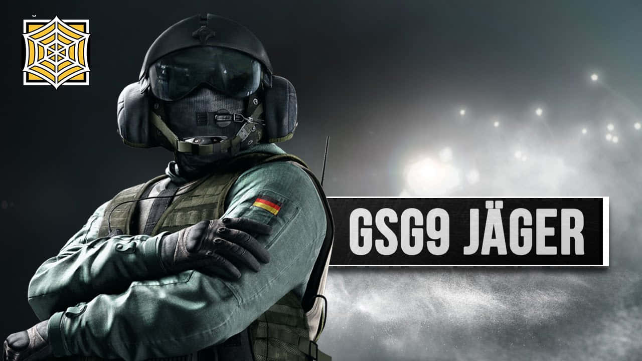 Rainbow Six Siege Jager 桌布 壁紙 — 一名身穿全套戰術裝備的德國GSG9 Jäger特種部隊士兵，在煙霧瀰漫的戰場背景下自信地交叉雙臂站立。