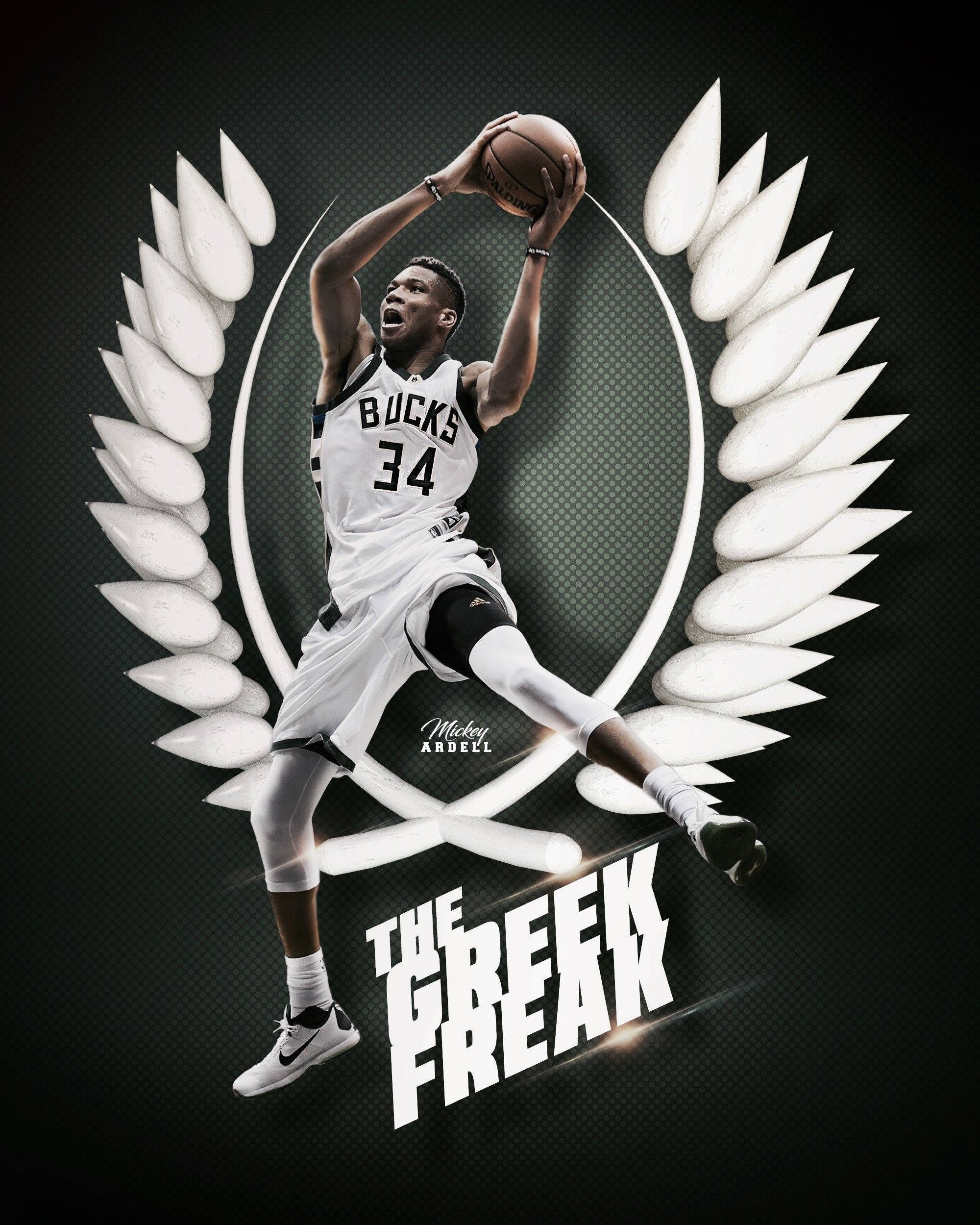 Giannis 桌布 壁紙 — 一名身穿公鹿隊球衣的籃球運動員，在深色紋理背景上，被白色月桂葉翅膀環繞，動態地跳躍持球。