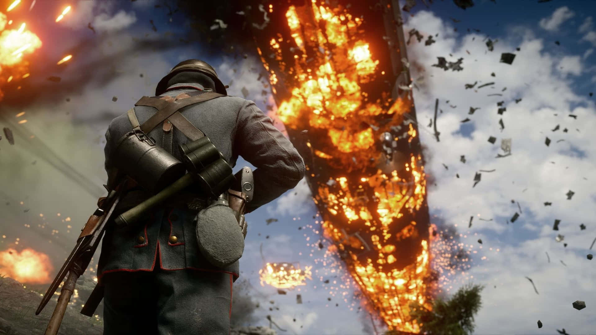 1920x1080 Battlefield 1 桌布 壁紙 — 一名身穿制服的士兵背對著一場撕裂天空的巨大火焰爆炸。