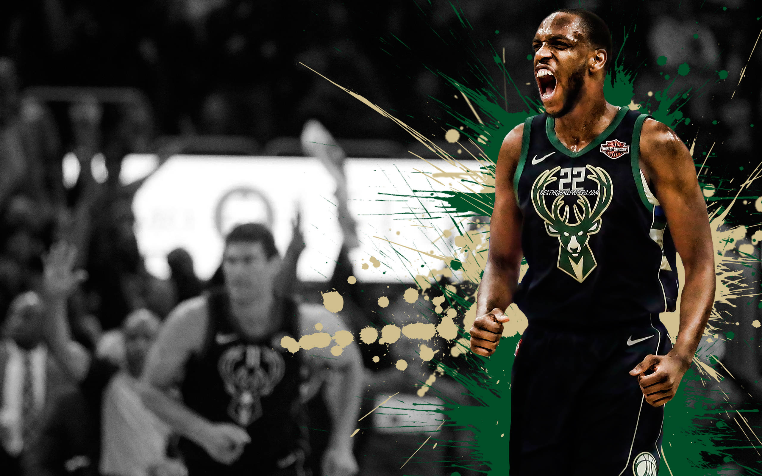 Bucks 桌布 壁紙 — 一名身穿密爾瓦基公鹿隊球衣的籃球運動員在身後彩色油漆飛濺中勝利咆哮。