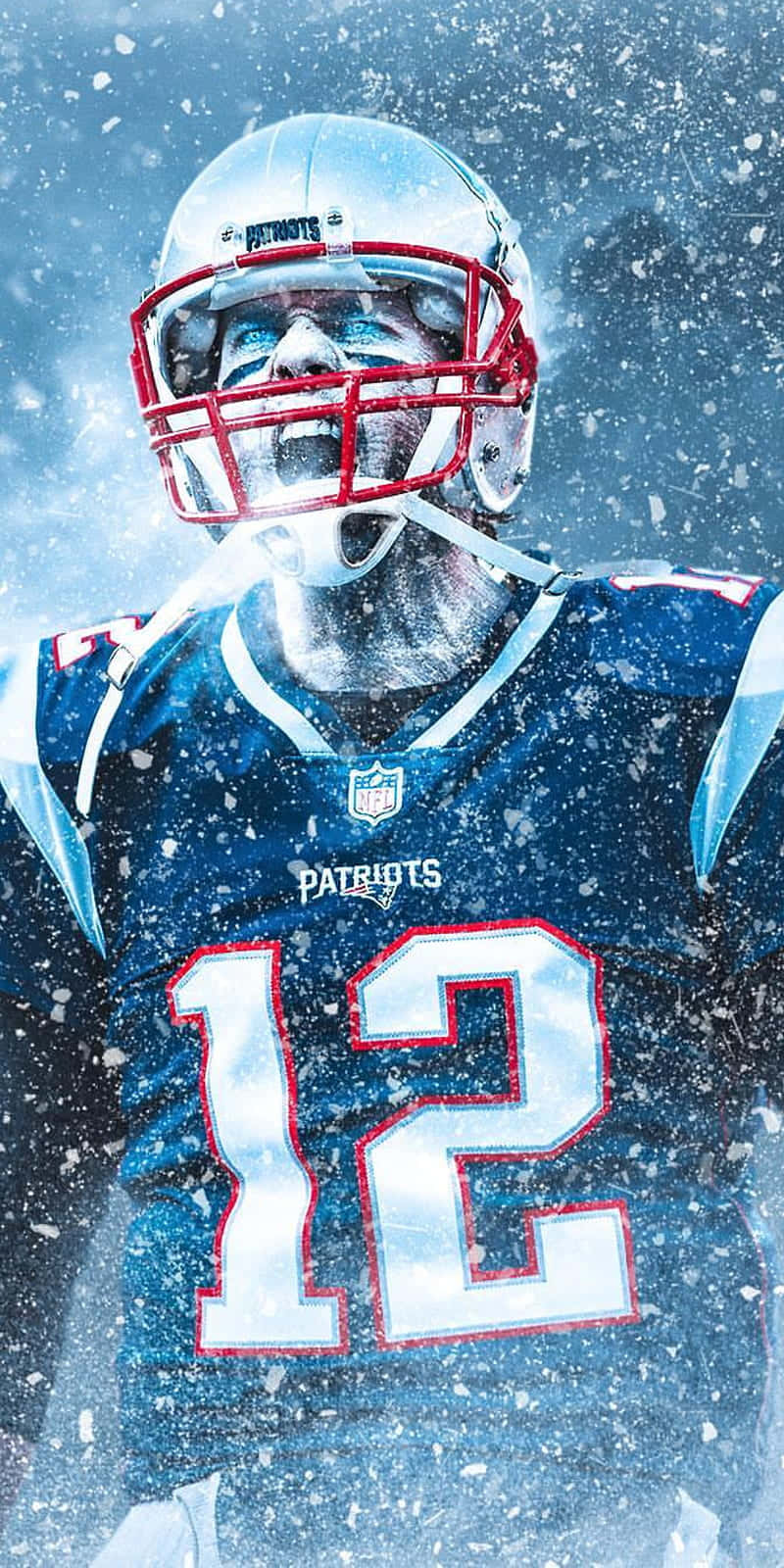 Tom Brady Goat 桌布 壁紙 — 一名身穿愛國者隊球衣的足球運動員在飄雪中咆哮，充滿兇猛決心。