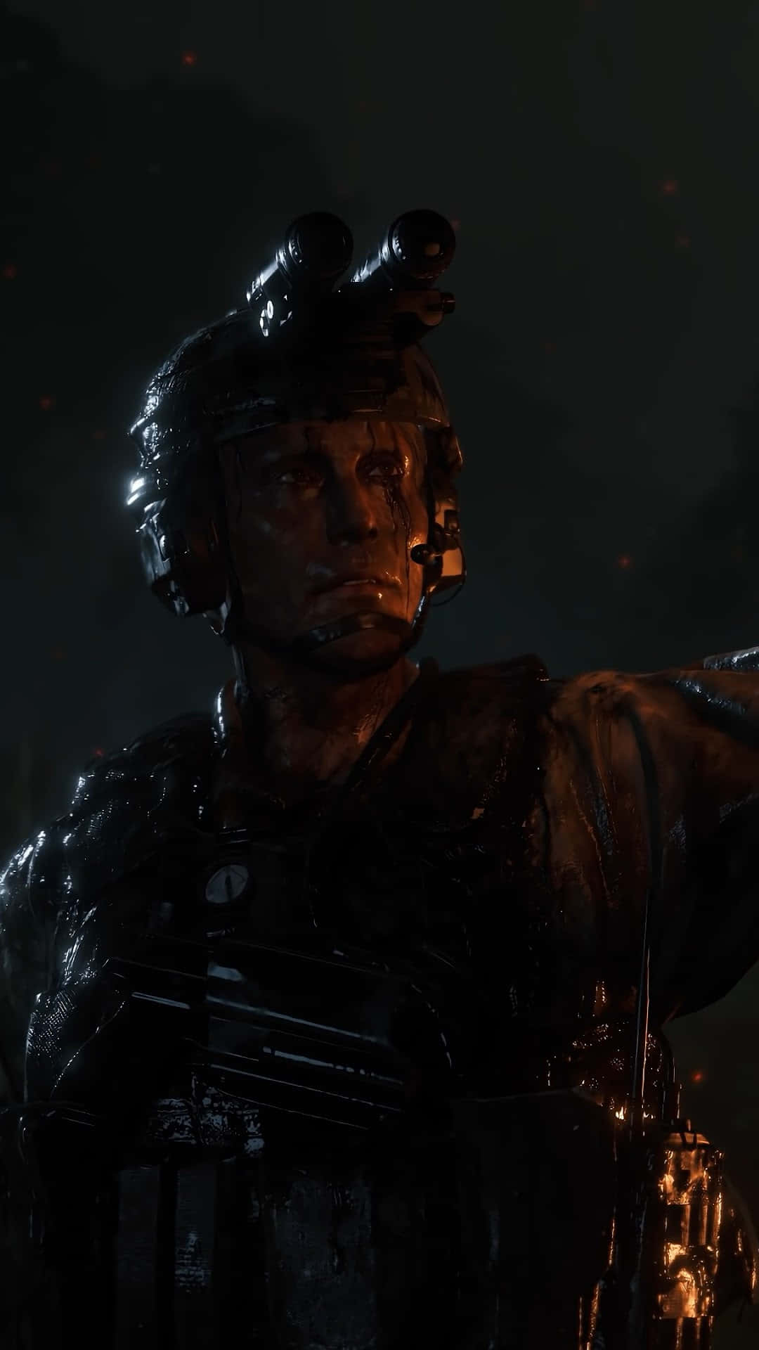 HD Death Stranding 桌布 壁紙 — 一名身穿戰術裝備、佩戴夜視鏡的士兵，在昏暗橙色燈光下的黑暗煙霧戰場中凝視。