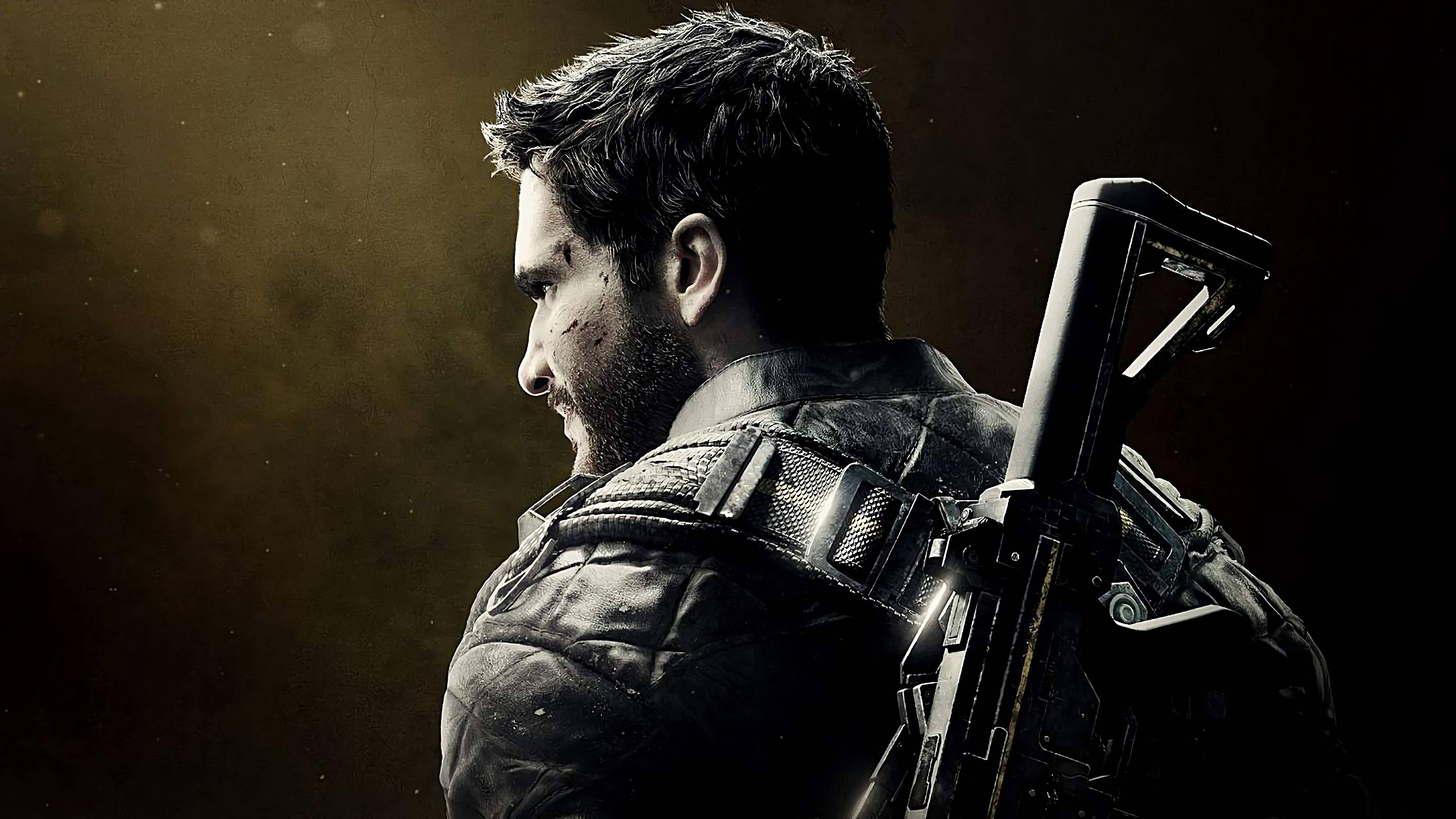Just Cause 4 桌布 壁紙 — 一名身穿戰術裝備、肩扛步槍的粗獷士兵，站在昏暗灰塵的光線中。