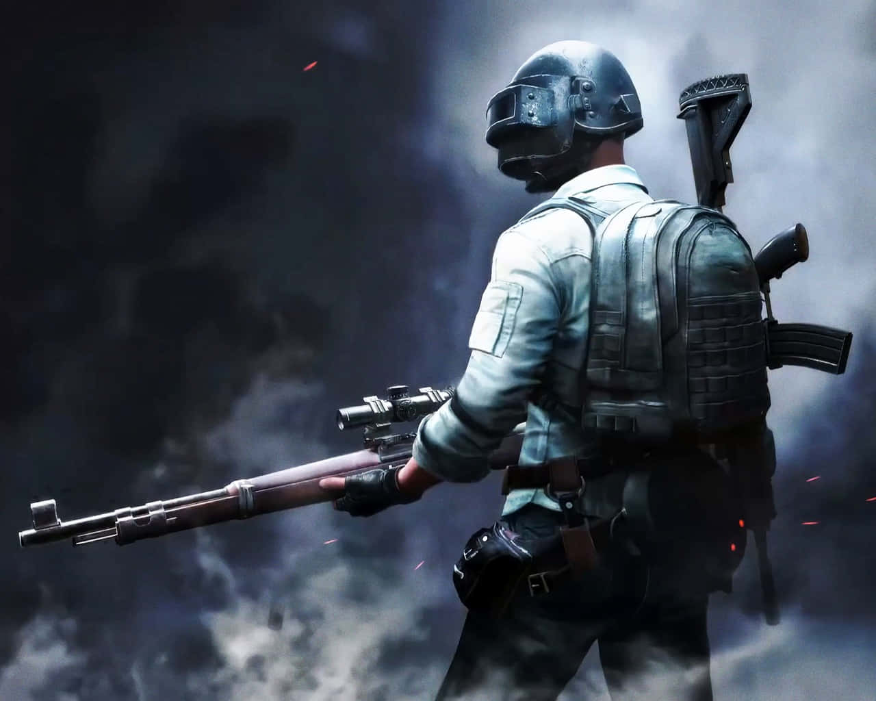 Pubg Guns 桌布 壁紙 — 一名身穿戰術裝備的士兵在煙霧瀰漫的戰場背景下手持步槍，周圍有發光的餘燼。