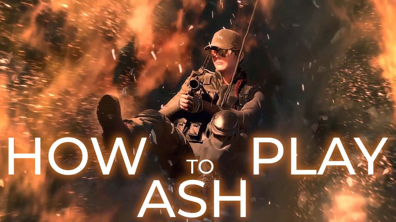 Rainbow Six Siege Ash 桌布 壁紙 — 一名身穿戰術裝備的士兵在熾熱爆炸和飛揚碎片中手持武器，並有粗體文字覆蓋。