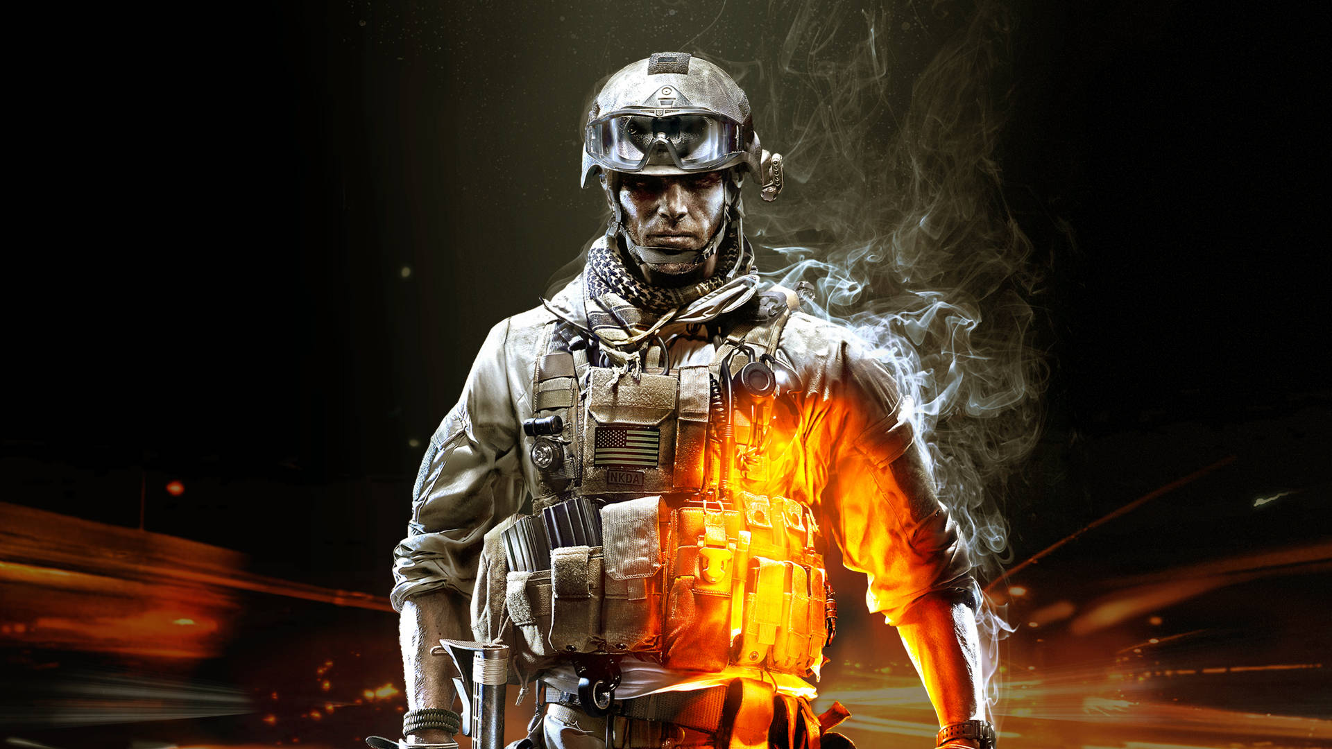 Battlefield 3 桌布 壁紙 — 一名身穿戰術裝備的士兵挑釁地站立，火焰吞噬他的軀幹，煙霧在黑暗背景中翻騰。