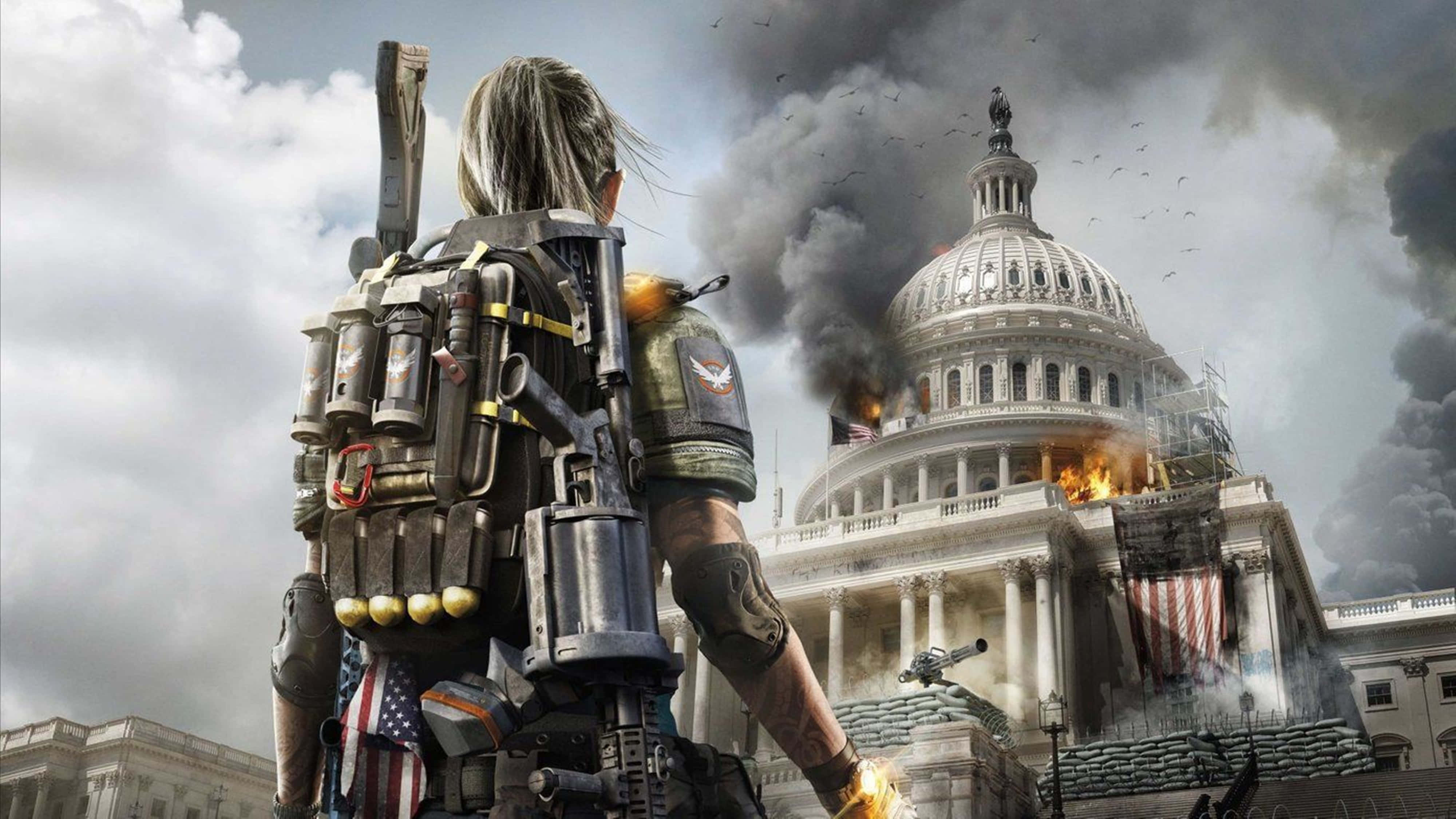 The Division 2 4K 桌布 壁紙 — 一名身穿戰術裝備的士兵站在煙霧瀰漫的天空下，面對著燃燒的國會大廈。