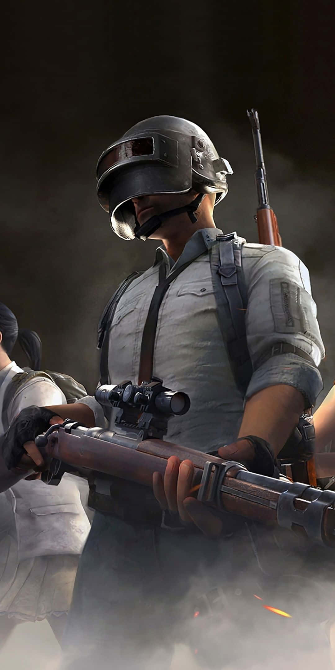 pubg mobile 桌布 壁紙 — 一名身穿戰鬥裝備的士兵在黑暗的戰場場景中，手持步槍，周圍有煙霧和火焰。