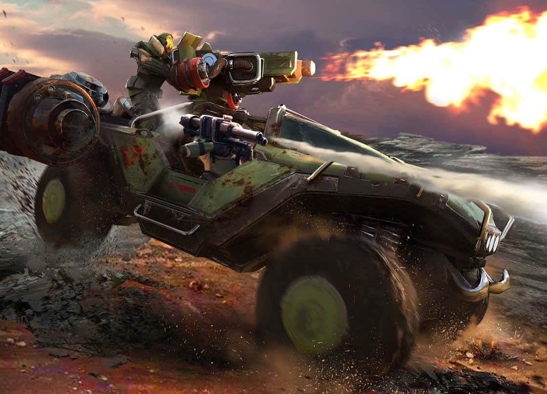 Scorpion Halo 桌布 壁紙 — 一名身穿戰鬥裝備的士兵從一輛堅固的綠色裝甲車上開火，該車在日落時分疾馳過塵土飛揚的戰場。