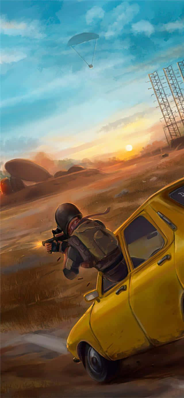 Pubg iPhone 桌布 壁紙 — 一名身穿戰鬥裝備的士兵從一輛黃色汽車開火，同時一個降落傘在沙漠日落時分下降。