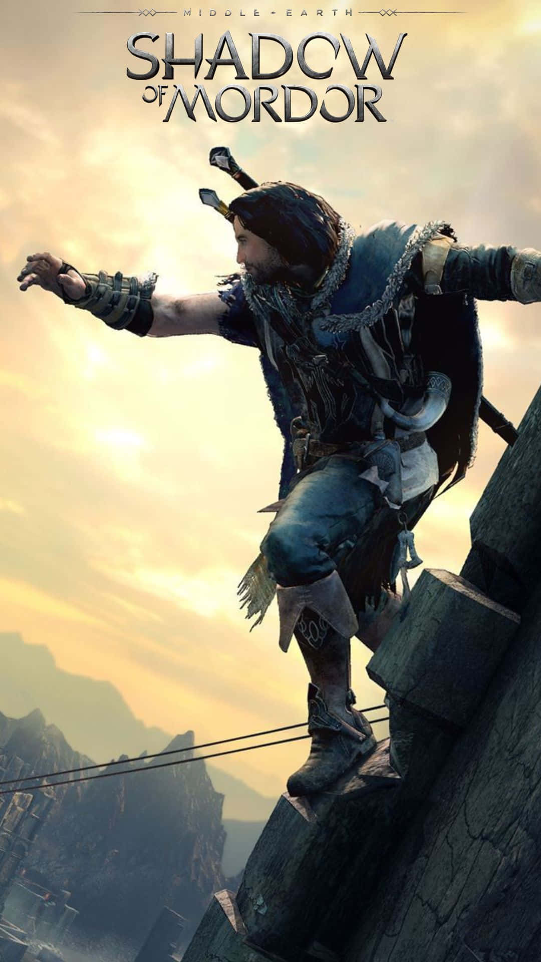 Android Shadow Of Mordor 桌布 壁紙 — 一名身穿暗色盔甲的戰士在搖搖欲墜的石崖邊緣保持平衡，背景是金色的日落天空和遠山。