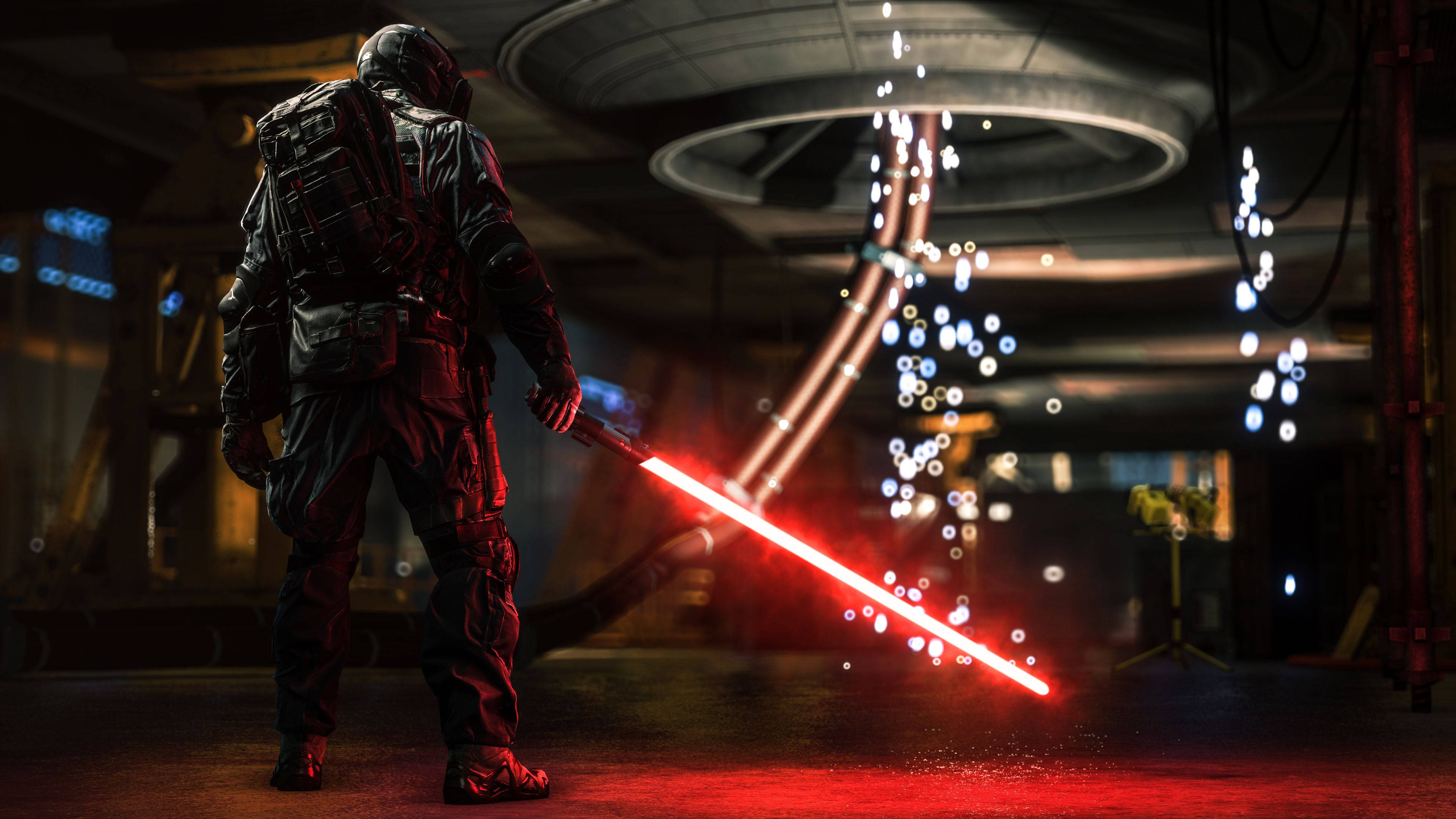 Sith 桌布 壁紙 — 一名身穿暗色盔甲的戰士站在昏暗的工業大廳中，揮舞著發光的紅色光劍，在地板上投射出熾熱的光芒。