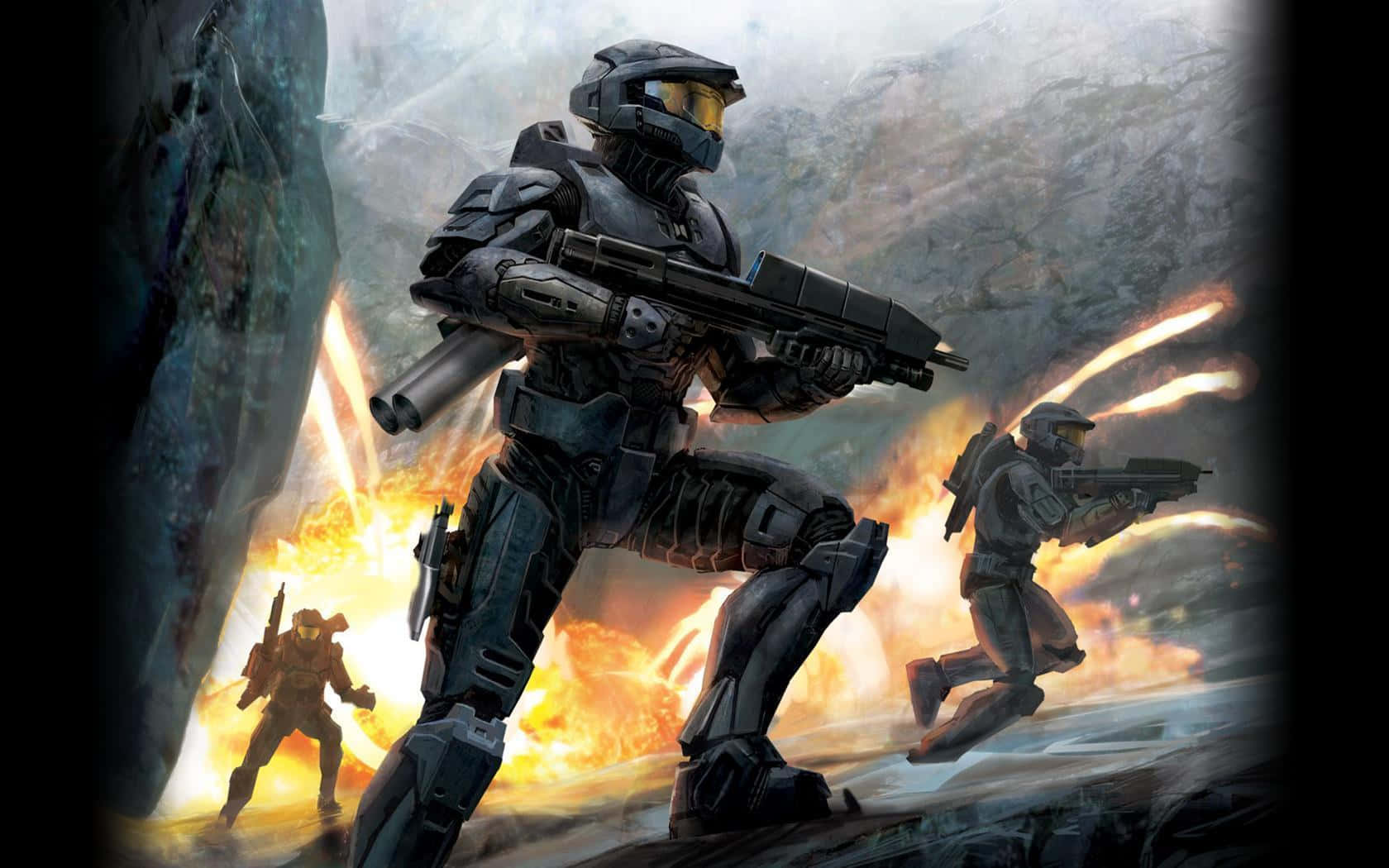 Halo Spartans 桌布 壁紙 — 一名身穿未來裝甲的士兵在熾熱的戰場上推進，隊友們在岩石地形中開火射擊。