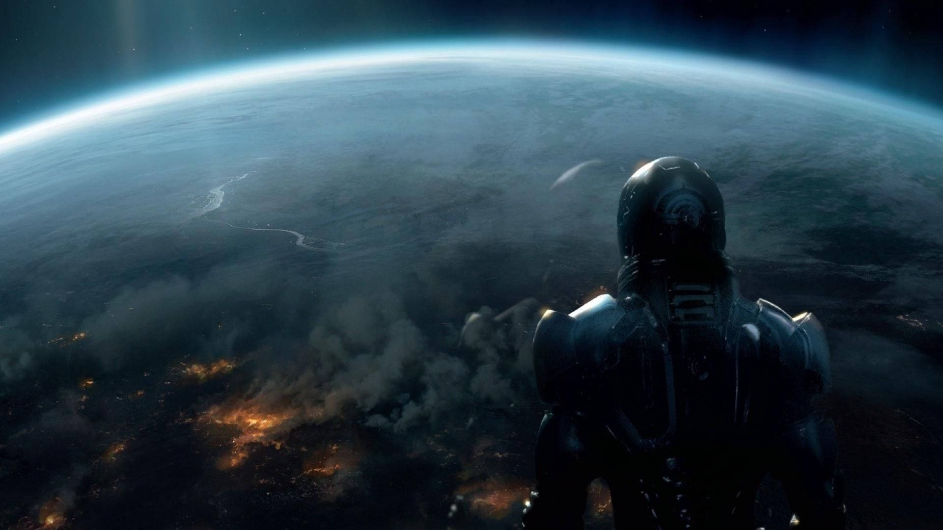 Mass Effect 3 桌布 壁紙 — 一名身穿深色太空衣的孤獨太空人凝視著地球彎曲的地平線，城市燈光在星空虛空中閃耀。