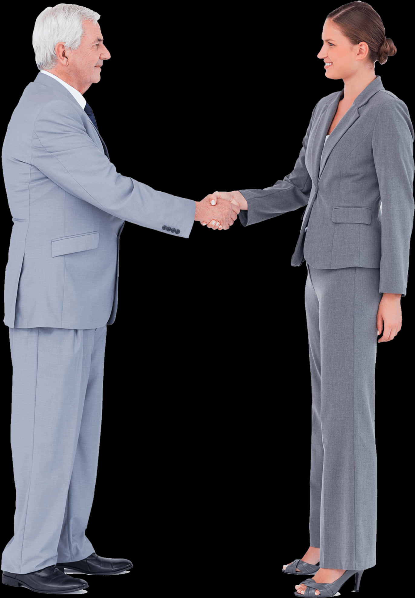 suit 桌布 壁紙 — 一名身穿灰色西裝的男士和女士在黑色背景前握手。