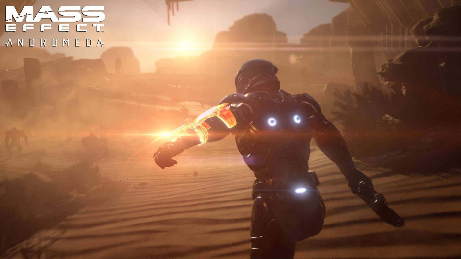 Mass Effect Andromeda 桌布 壁紙 — 一名身穿發光盔甲的未來士兵在沙漠景觀中奔跑，夕陽落在古老遺跡後面。