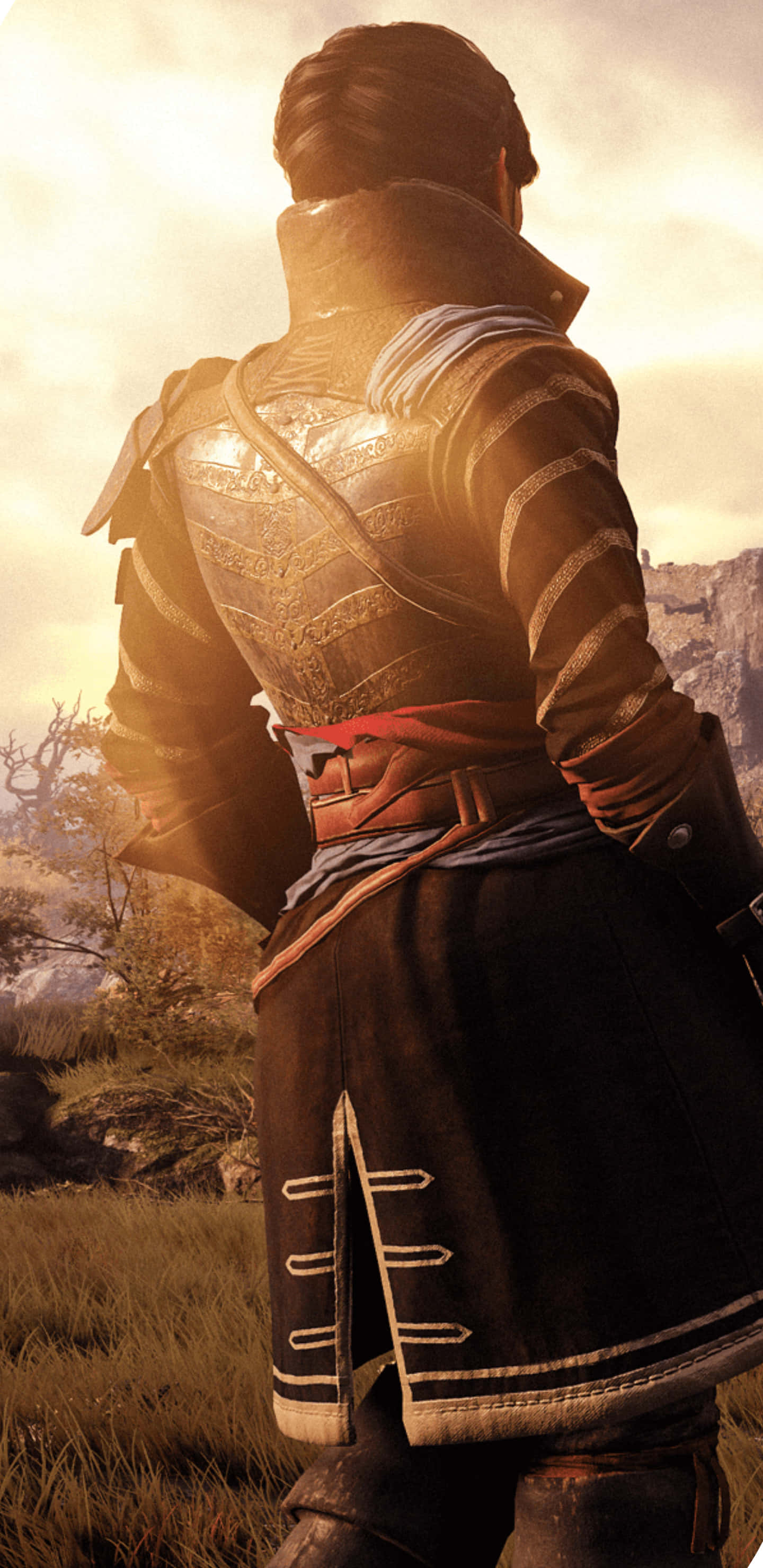 Pixel 3xl Greedfall 桌布 壁紙 — 一名身穿精細盔甲的戰士在崎嶇的山地地形上，背對著金色的日落光芒。