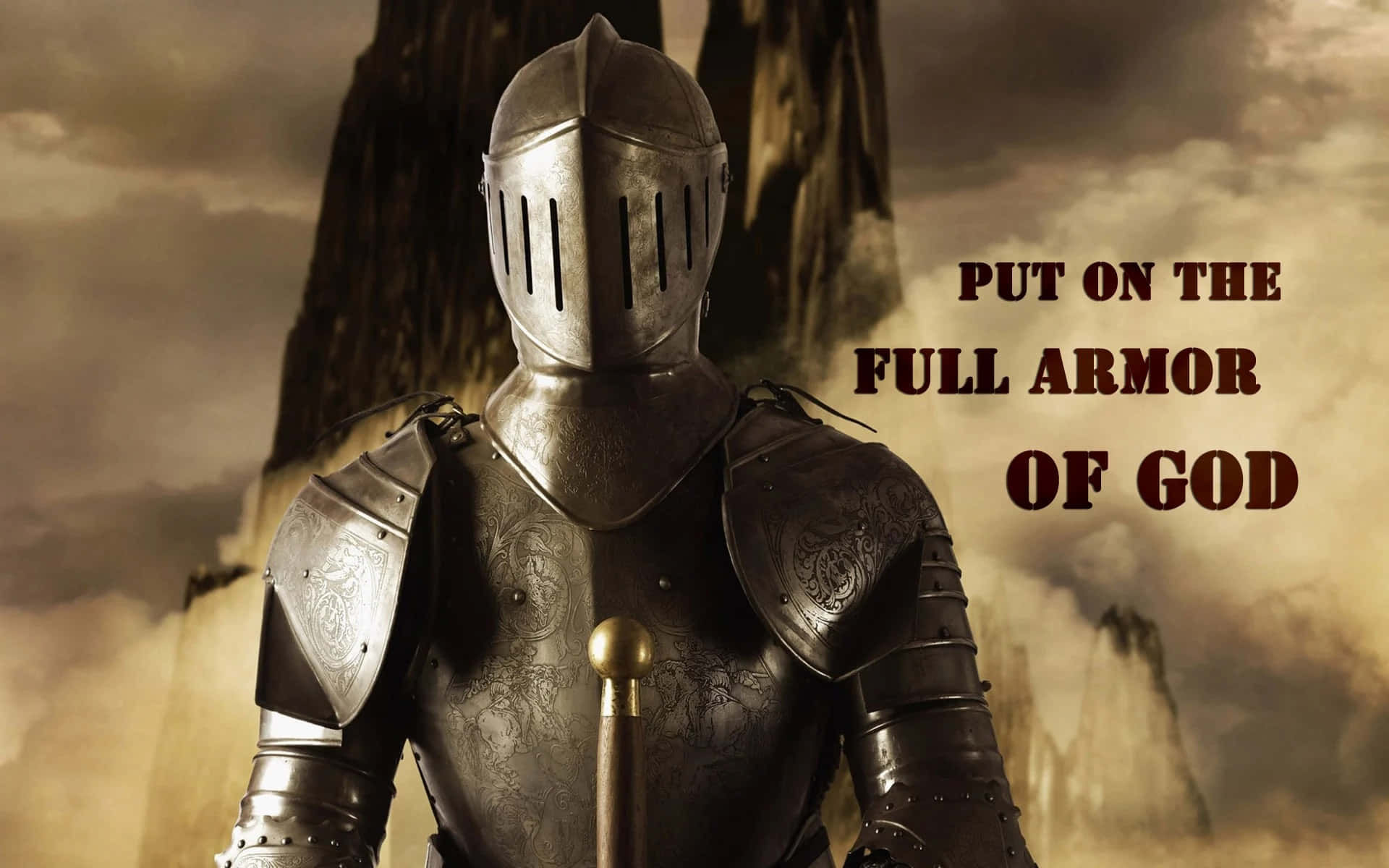 Armor Of God 桌布 壁紙 — 一名身穿精細金屬盔甲的騎士，在暴風雨的天空和崎嶇的懸崖背景下莊嚴站立，手持金色頂端的杖。