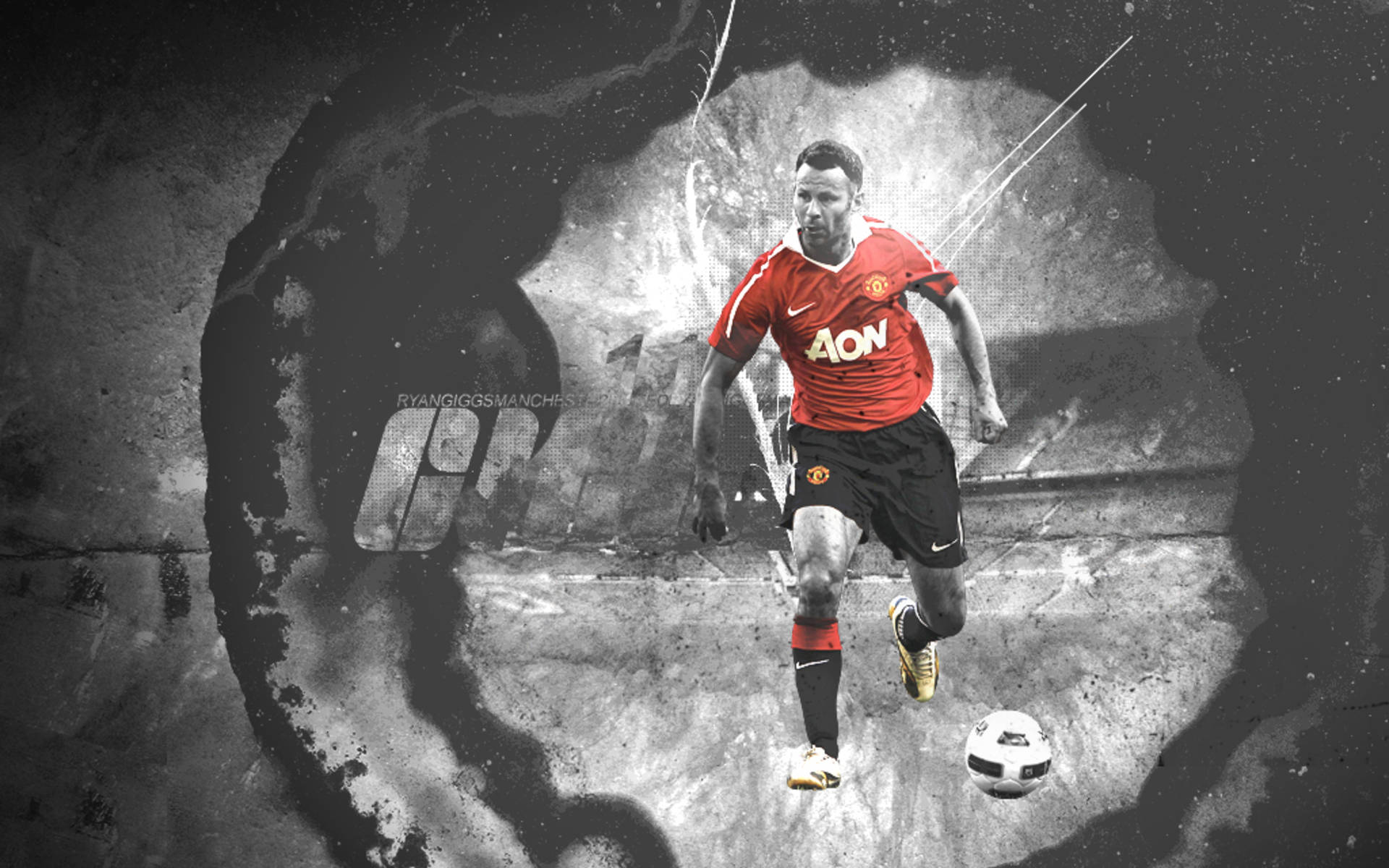Ryan Giggs 桌布 壁紙 — 一名身穿紅色曼聯球衣的足球員在戲劇性燈光下運球穿過一條裂開的混凝土隧道。