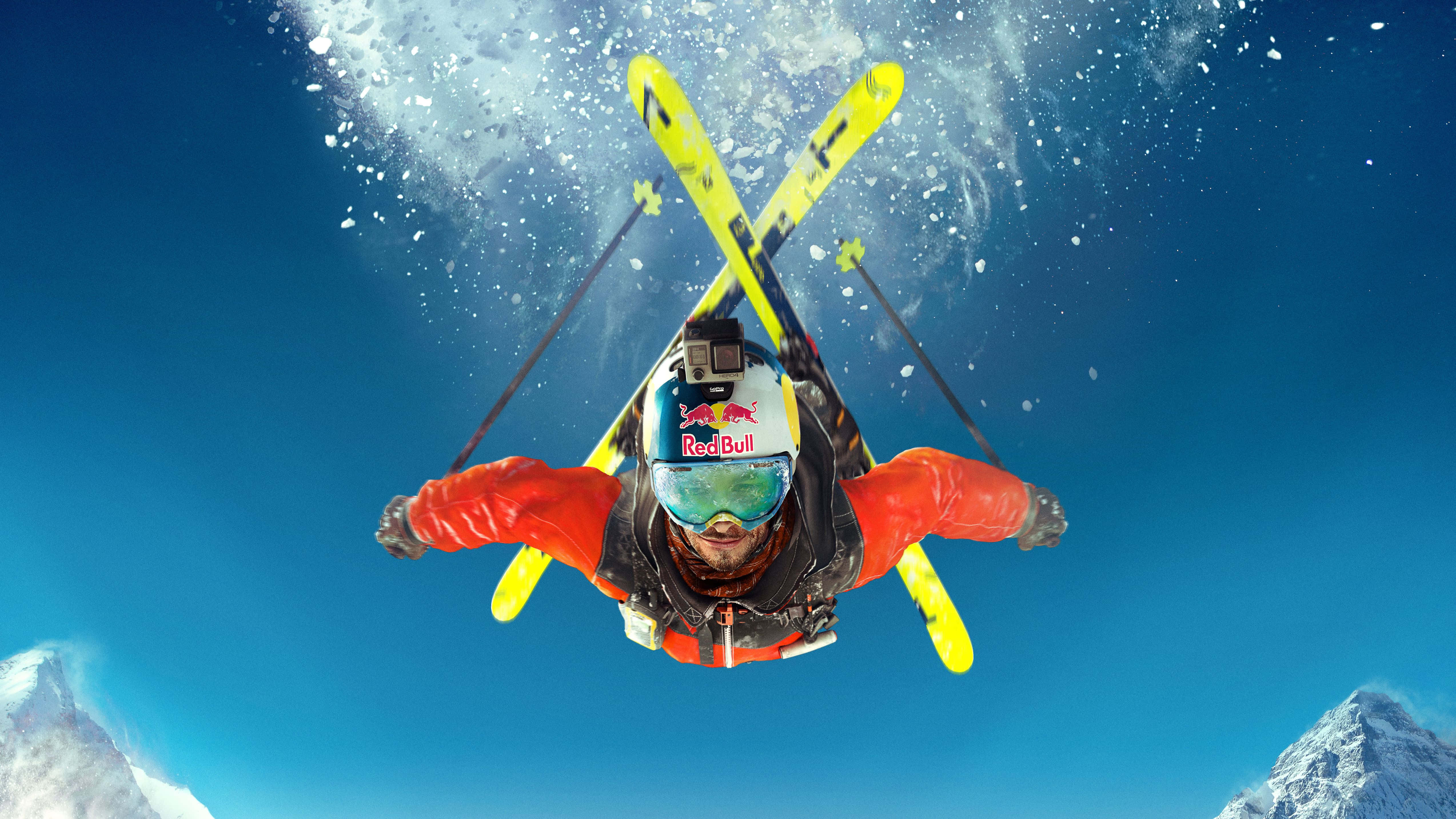 Snowboarding 桌布 壁紙 — 一名身穿紅色滑雪服和頭盔的滑雪者，在清澈的藍天中飛翔，黃色滑雪板交叉在積雪的山峰之上。