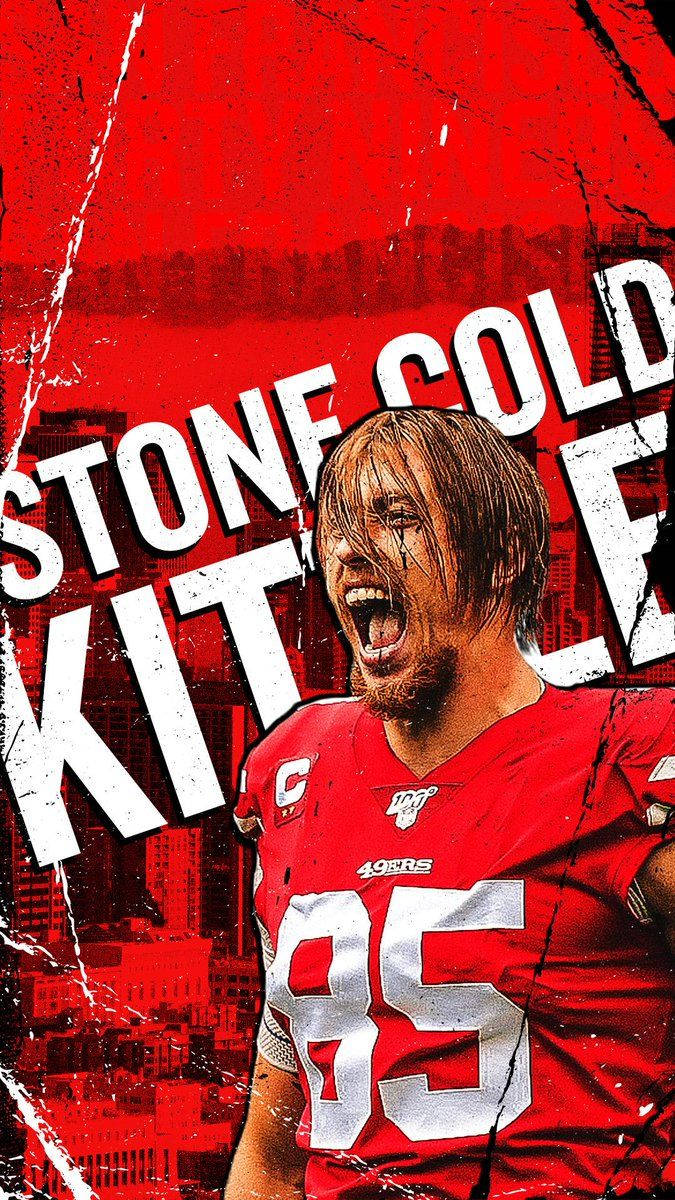 49ers 桌布 壁紙 — 一名身穿紅色球衣的兇猛足球員在粗糙的城市背景下激烈咆哮。