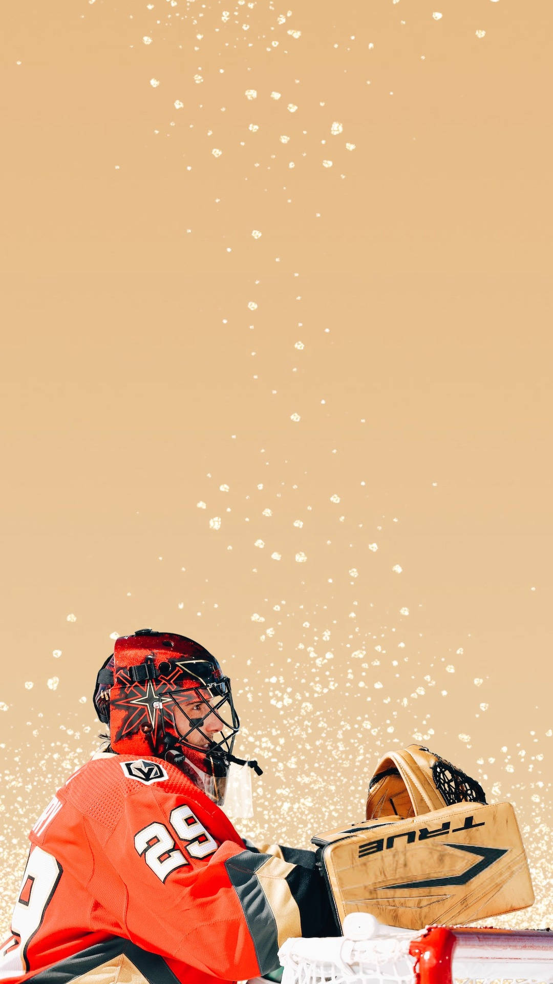 hockey 桌布 壁紙 — 一名身穿紅色裝備、號碼29的冰球守門員在溫暖米色背景前，雪花飄落之際準備就緒。