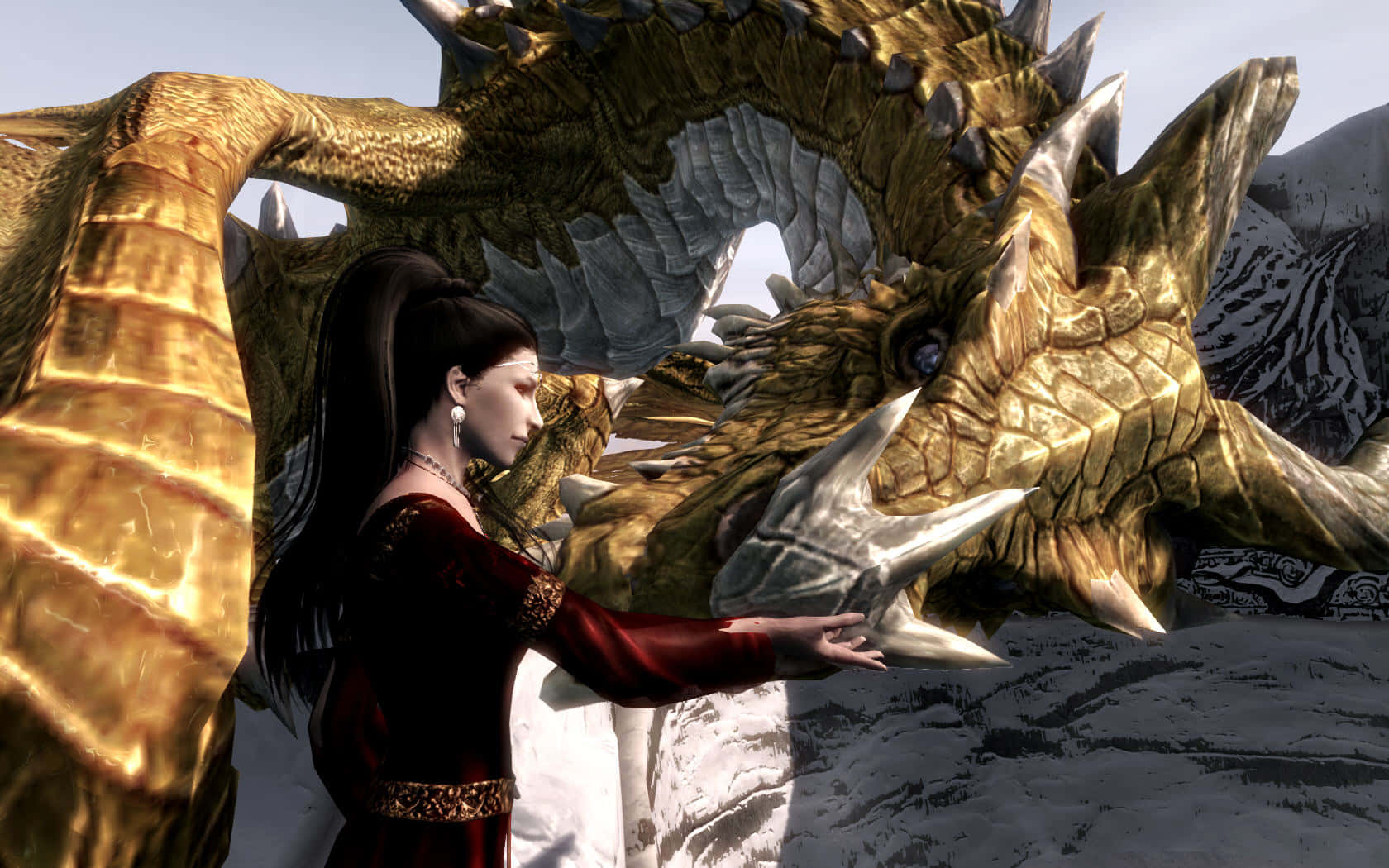 Skyrim Paarthurnax 桌布 壁紙 — 一名身穿紅衣的女子在雪山中輕輕觸摸一條巨大金龍的鼻子。