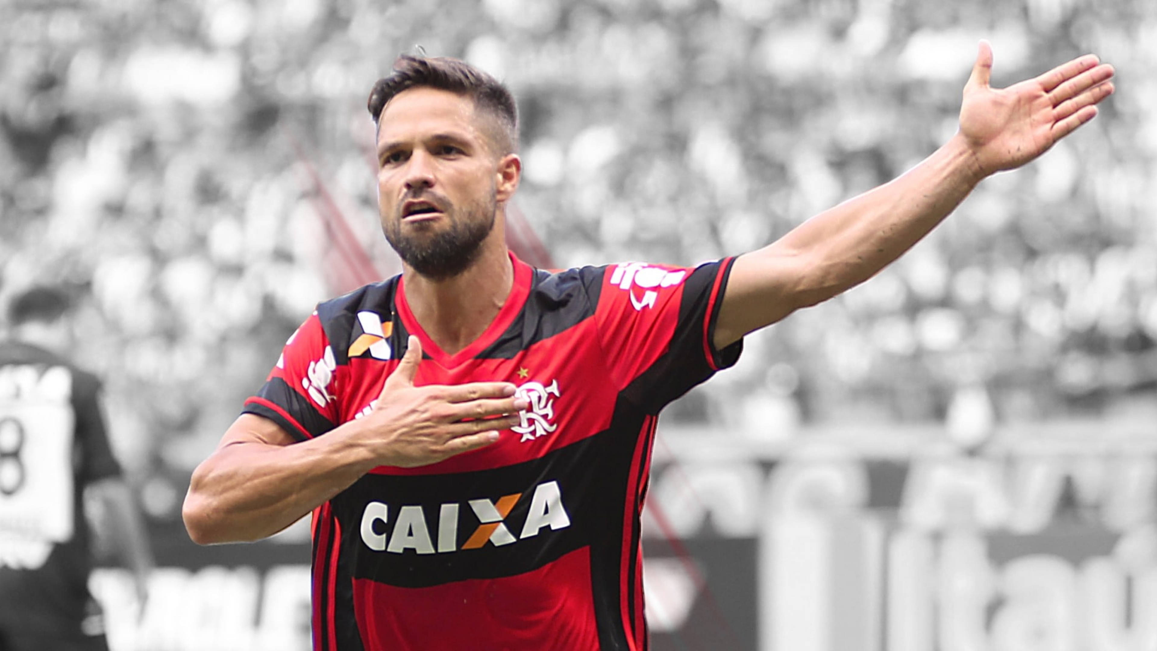 flamengo fc 桌布 壁紙 — 一名身穿紅黑球衣的足球員，一手放在胸前，另一手舉向歡呼的球迷慶祝。