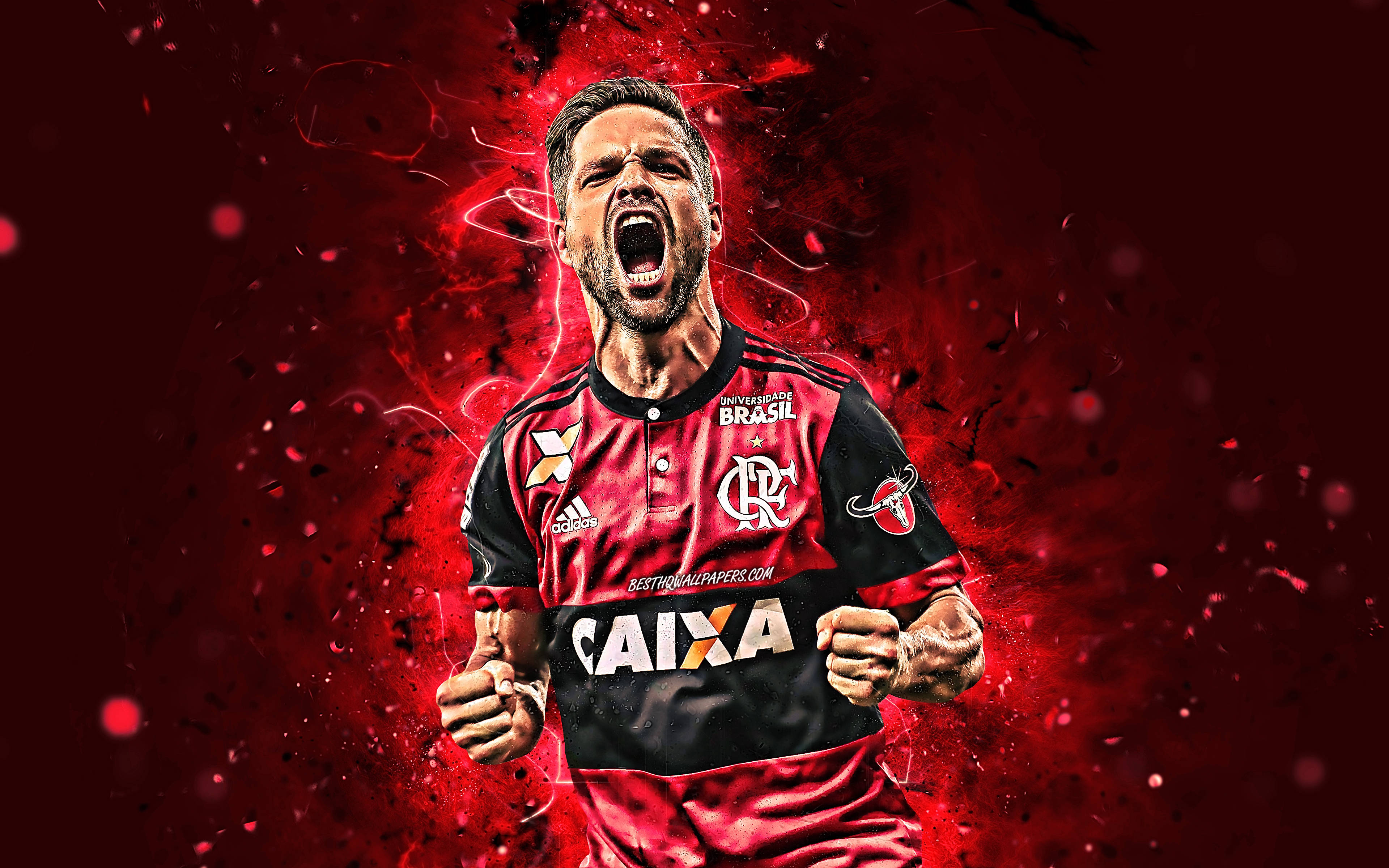 flamengo fc 桌布 壁紙 — 一名身穿紅黑球衣的足球運動員在動態的紅色能量爆發背景下發出勝利的咆哮。