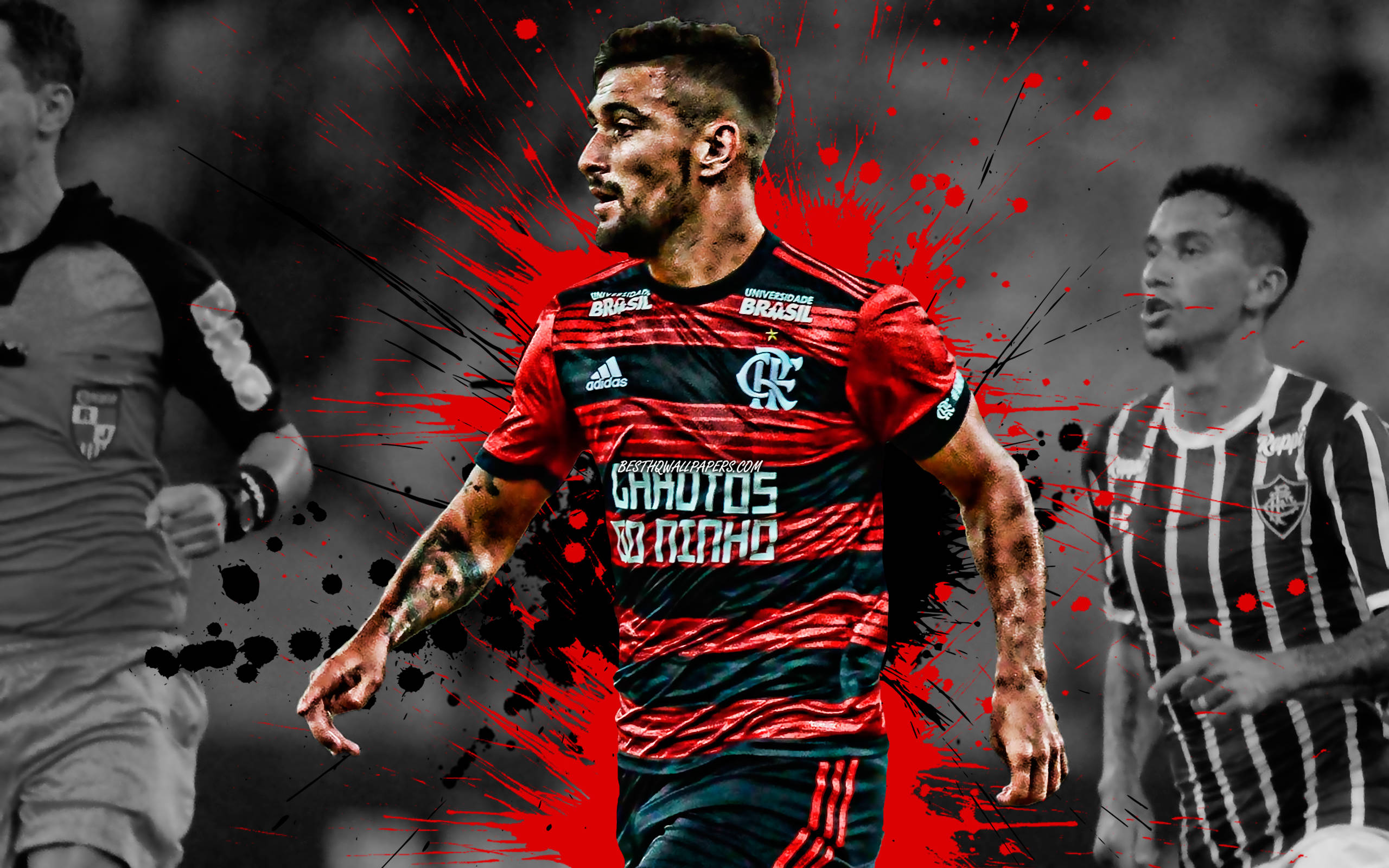 flamengo fc 桌布 壁紙 — 一名身穿紅黑間條球衣的足球員，帶著強烈的專注力向前邁進，紅色和黑色的顏料飛濺在他周圍爆發。