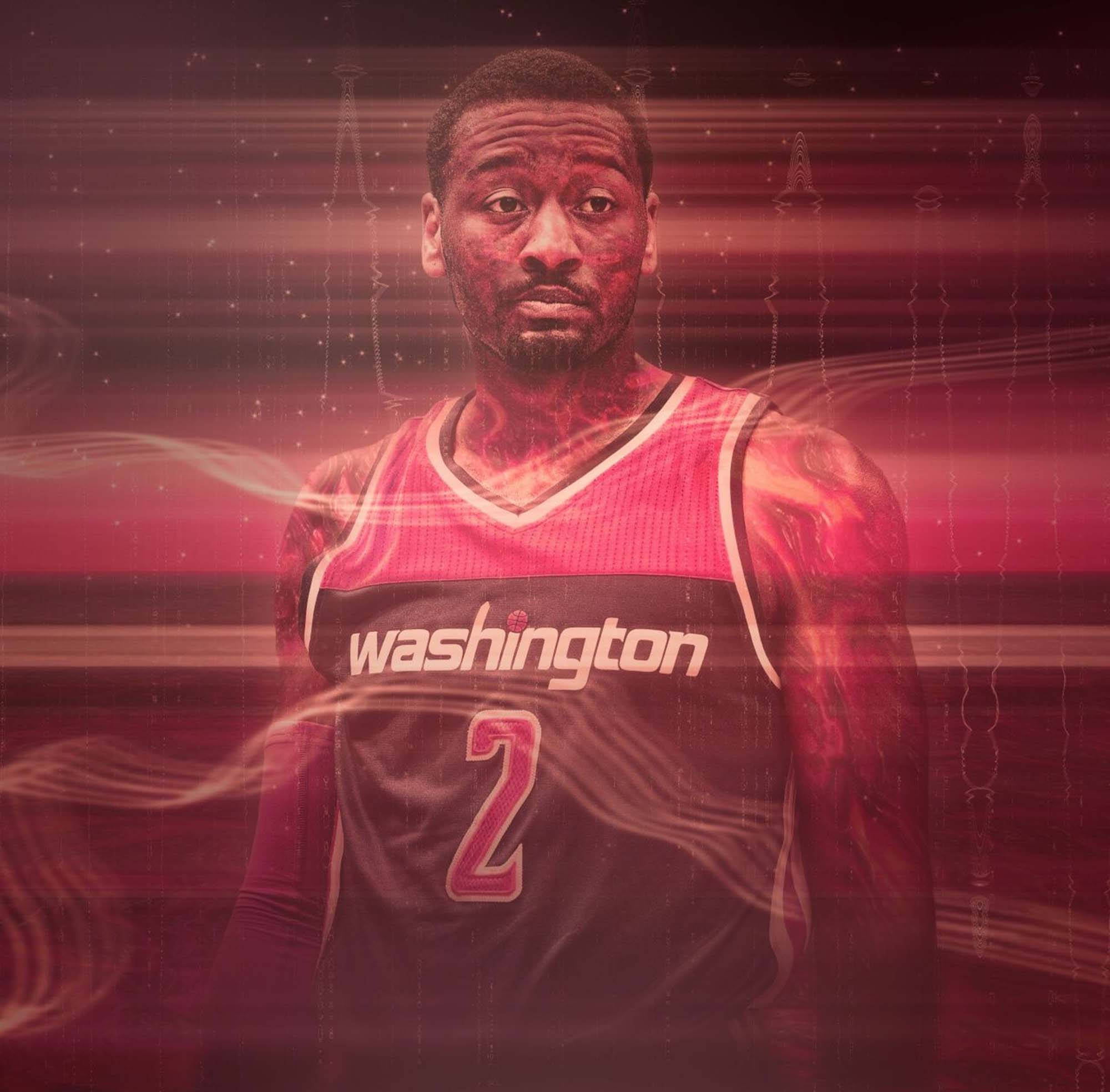 John Wall 桌布 壁紙 — 一名身穿華盛頓球衣的籃球運動員站在帶有數位能量效果的發光紅色抽象背景前。