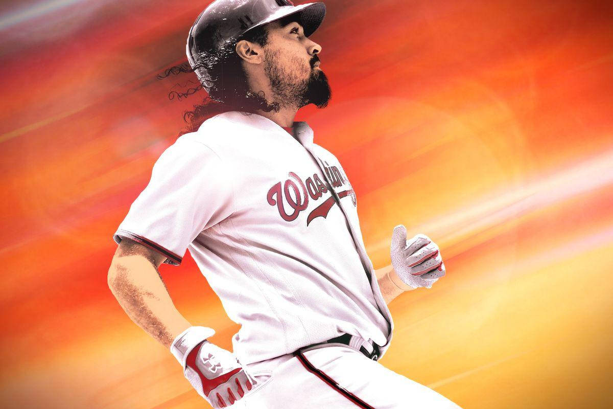 anthony rendon 桌布 壁紙 — 一名身穿華盛頓隊服的棒球選手，在火紅橙色的動態模糊背景中向前衝刺。