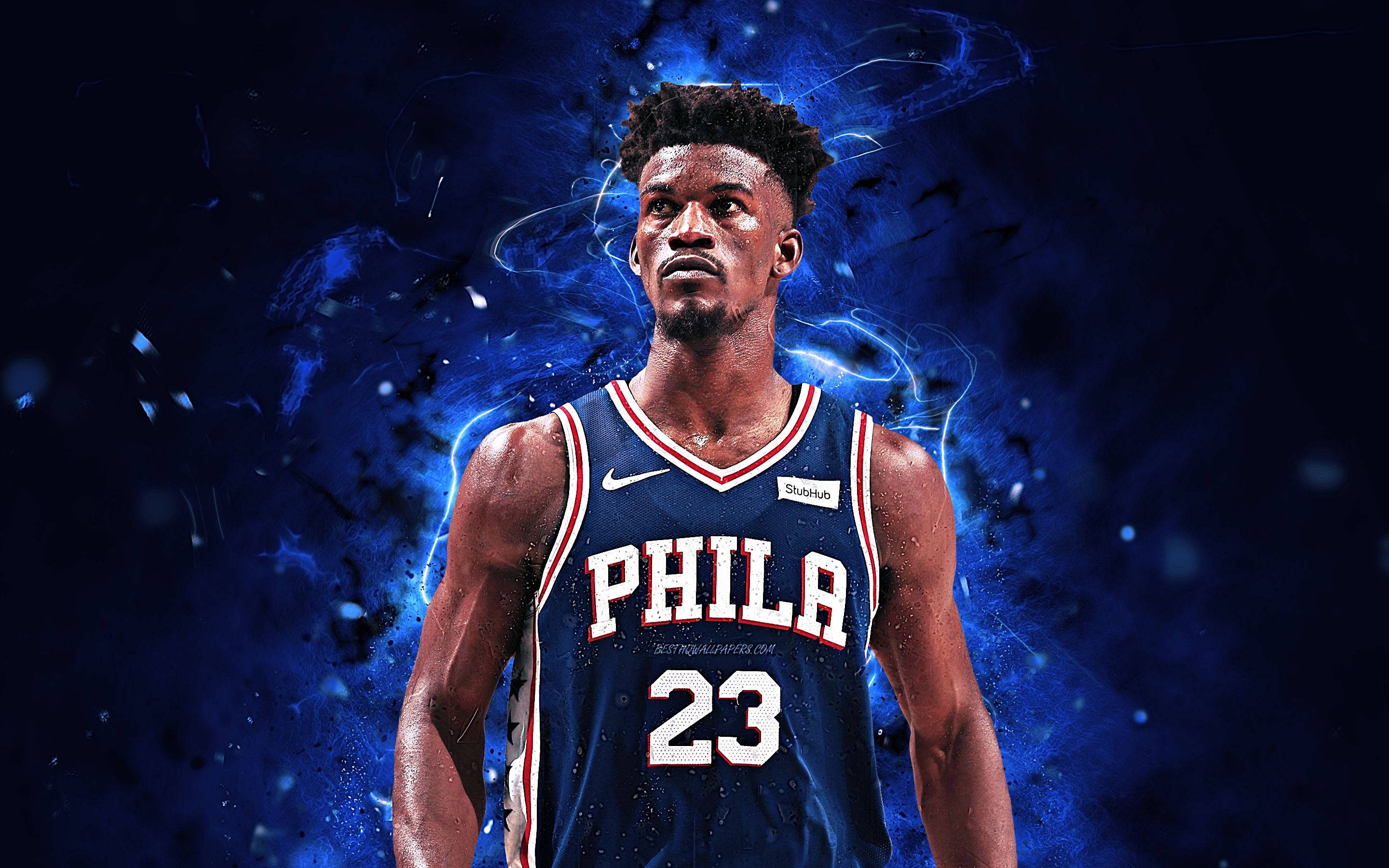 jimmy 桌布 壁紙 — 一名身穿藍色「PHILA 23」球衣的籃球運動員，站在動態的電光藍色能量爆發背景前。
