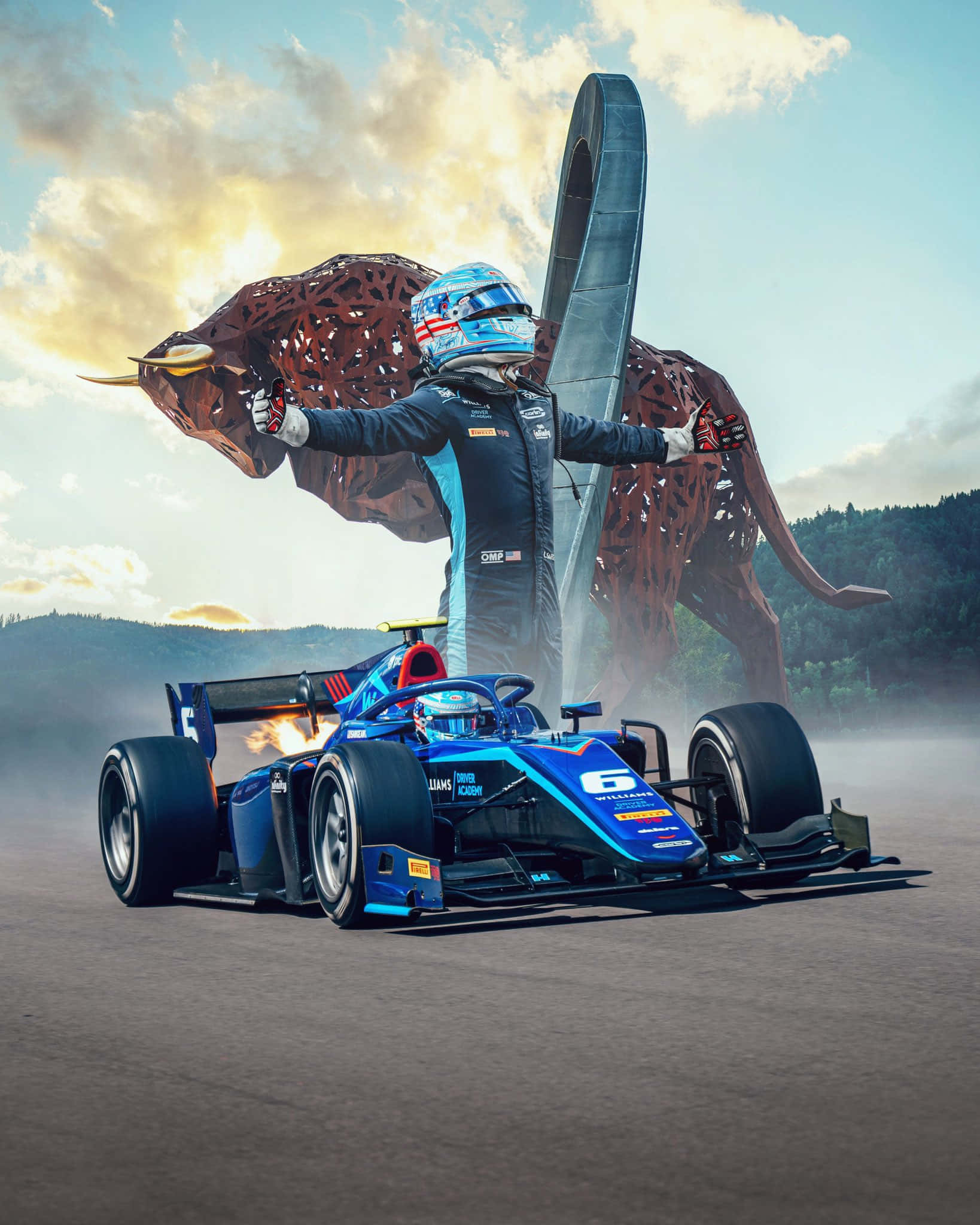 Formula 1 iPhone 桌布 壁紙 — 一名身穿藍色賽車服的賽車手，雙臂張開，勝利地站在他的藍色賽車旁邊，身後一個巨大的金屬公牛雕塑在夕陽下的塵土飛揚的賽道上若隱若現。