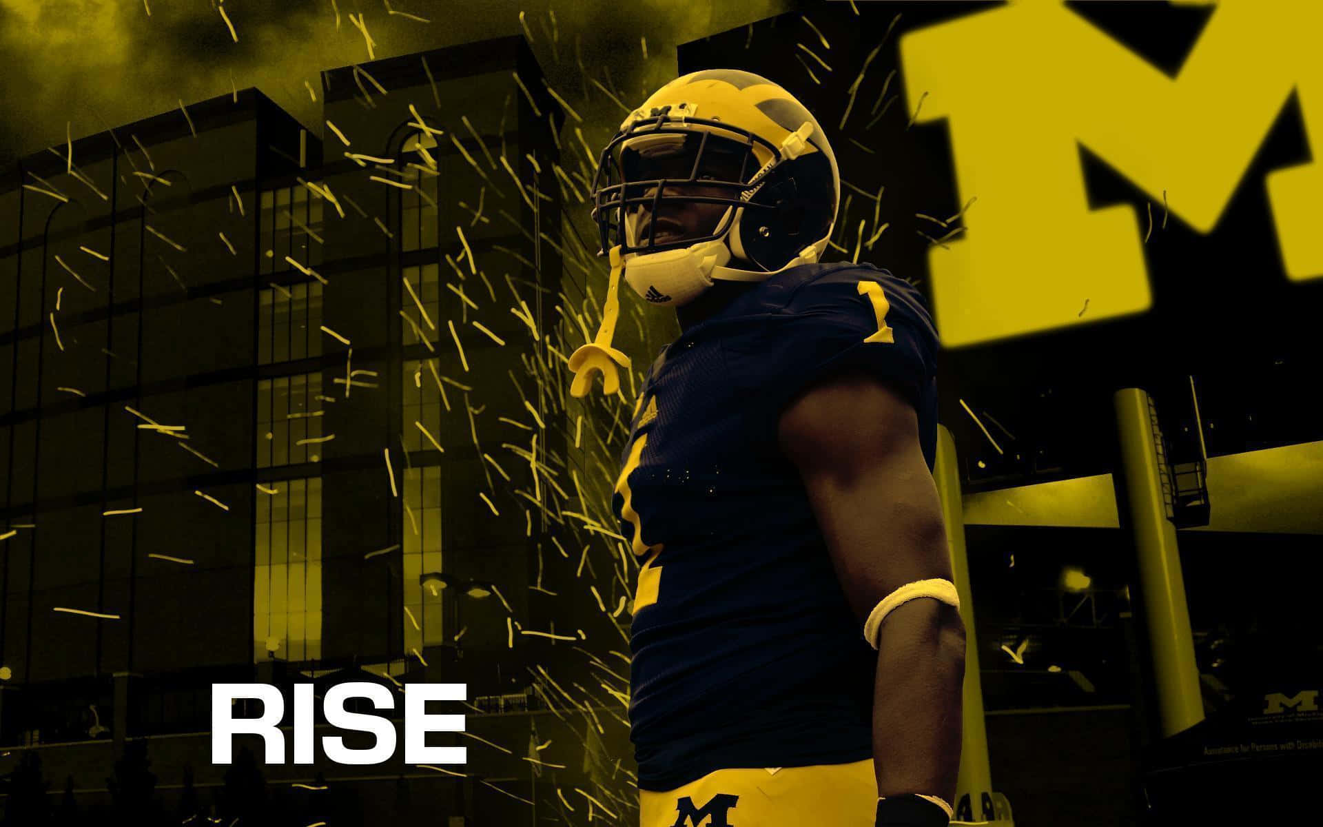 Michigan Football 桌布 壁紙 — 一名身穿藍黃裝備的足球員自信地站立，火花在他周圍飛舞，背景是黑暗的城市。