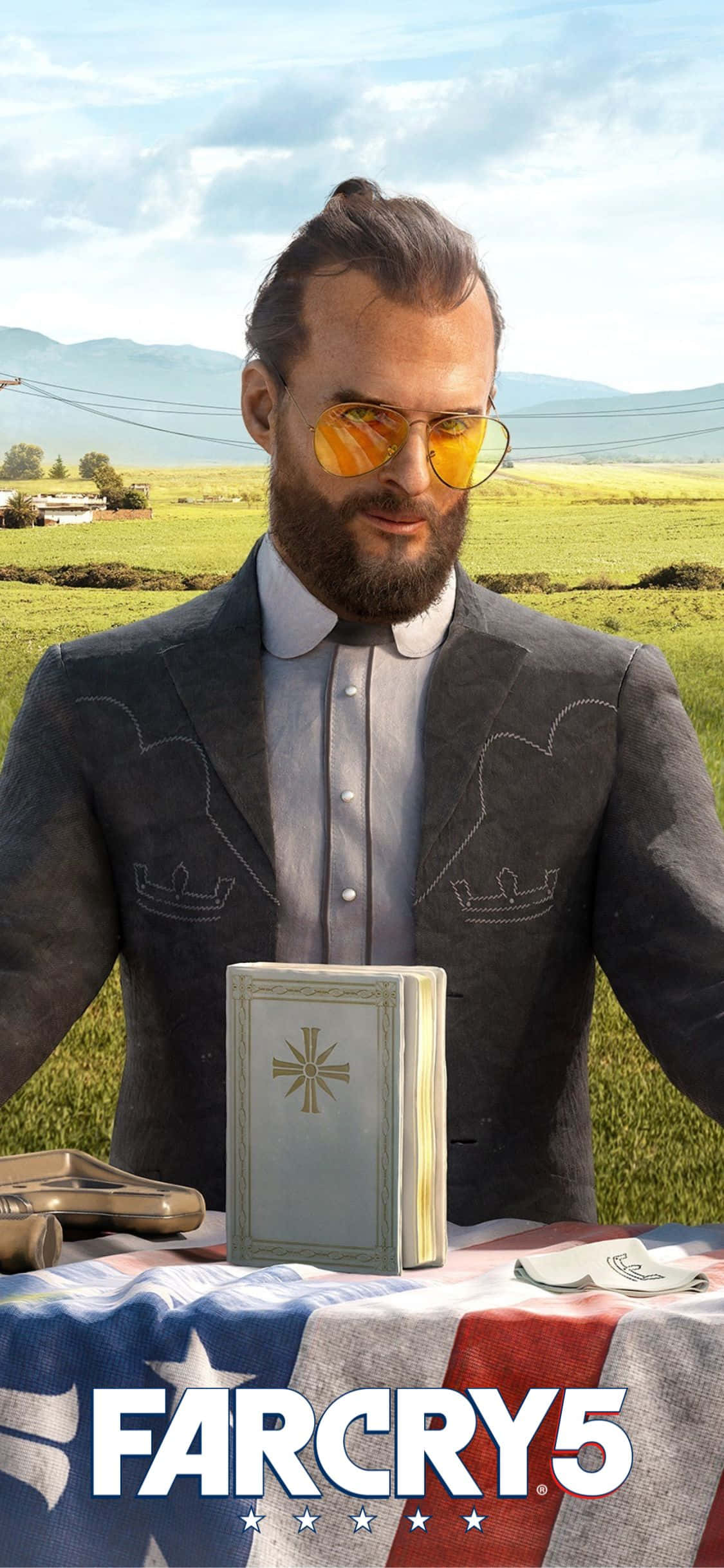 iPhone Xs Far Cry 5 桌布 壁紙 — 一名身穿西裝、戴黃色太陽眼鏡的男子站在草地上，手持一本帶有十字架標誌的書。