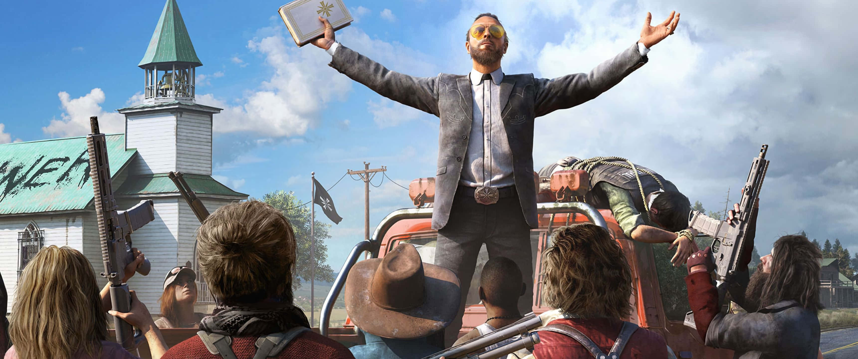 3440x1440p Far Cry 5 桌布 壁紙 — 一名身穿西裝的男子站在卡車上，高舉一本書，雙臂抬起，而武裝追隨者在教堂附近觀看。