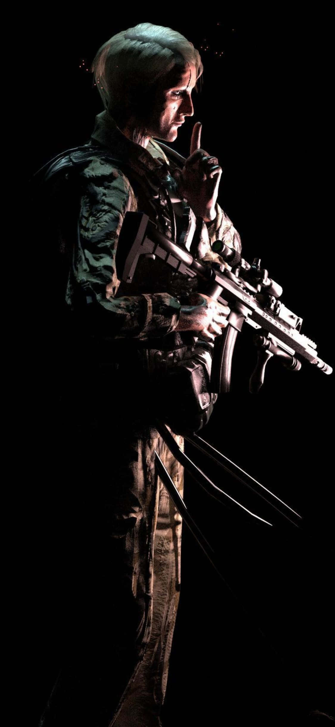 iPhone X Death Stranding 桌布 壁紙 — 一名身穿迷彩裝備的士兵手持步槍，在黑色背景前做出噤聲手勢。